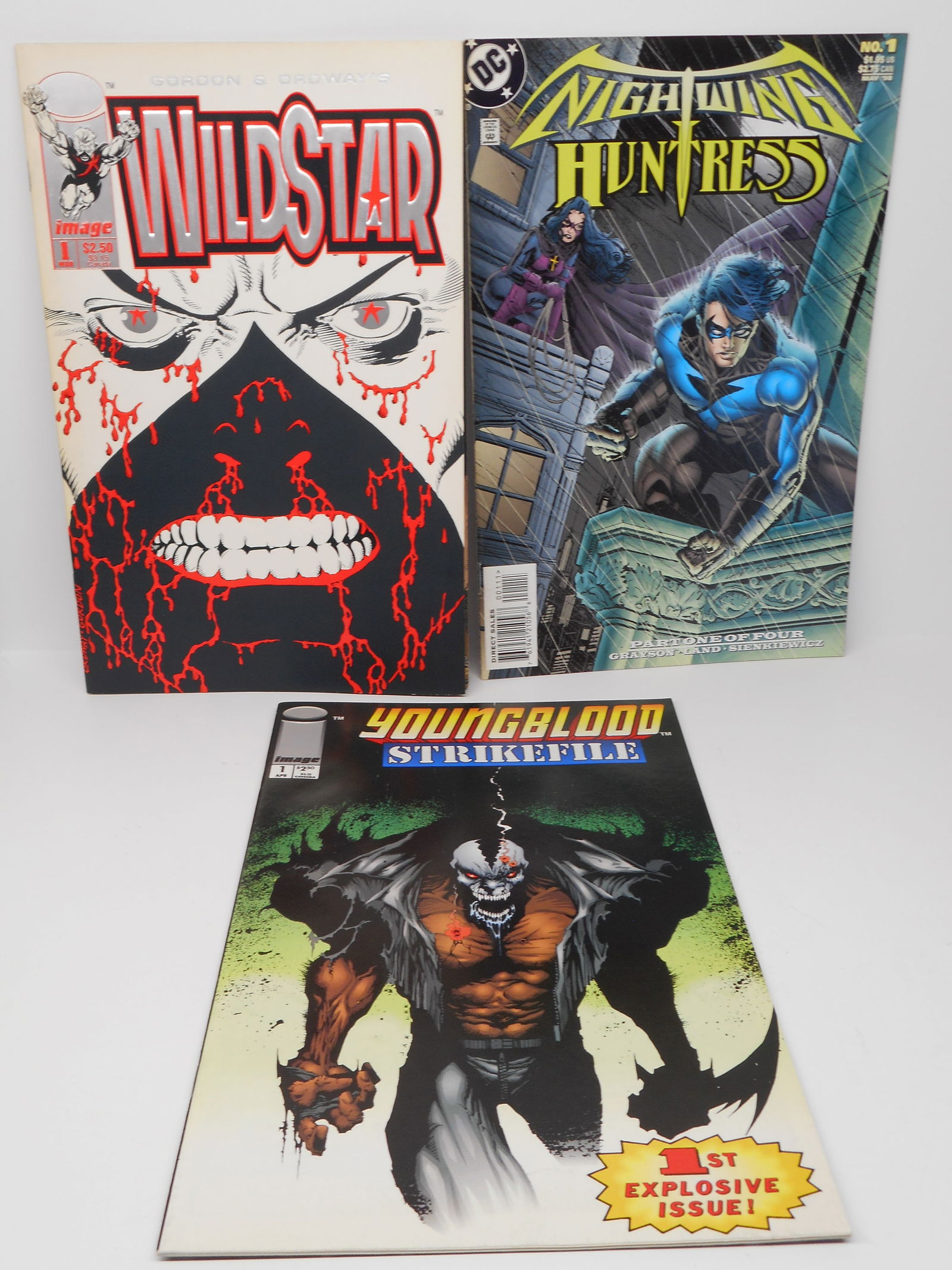 Three Vintage 1st (First) Issue Comics - Nightwing Huntress, WildStar and Youngblood Strikefile (1 of 3)