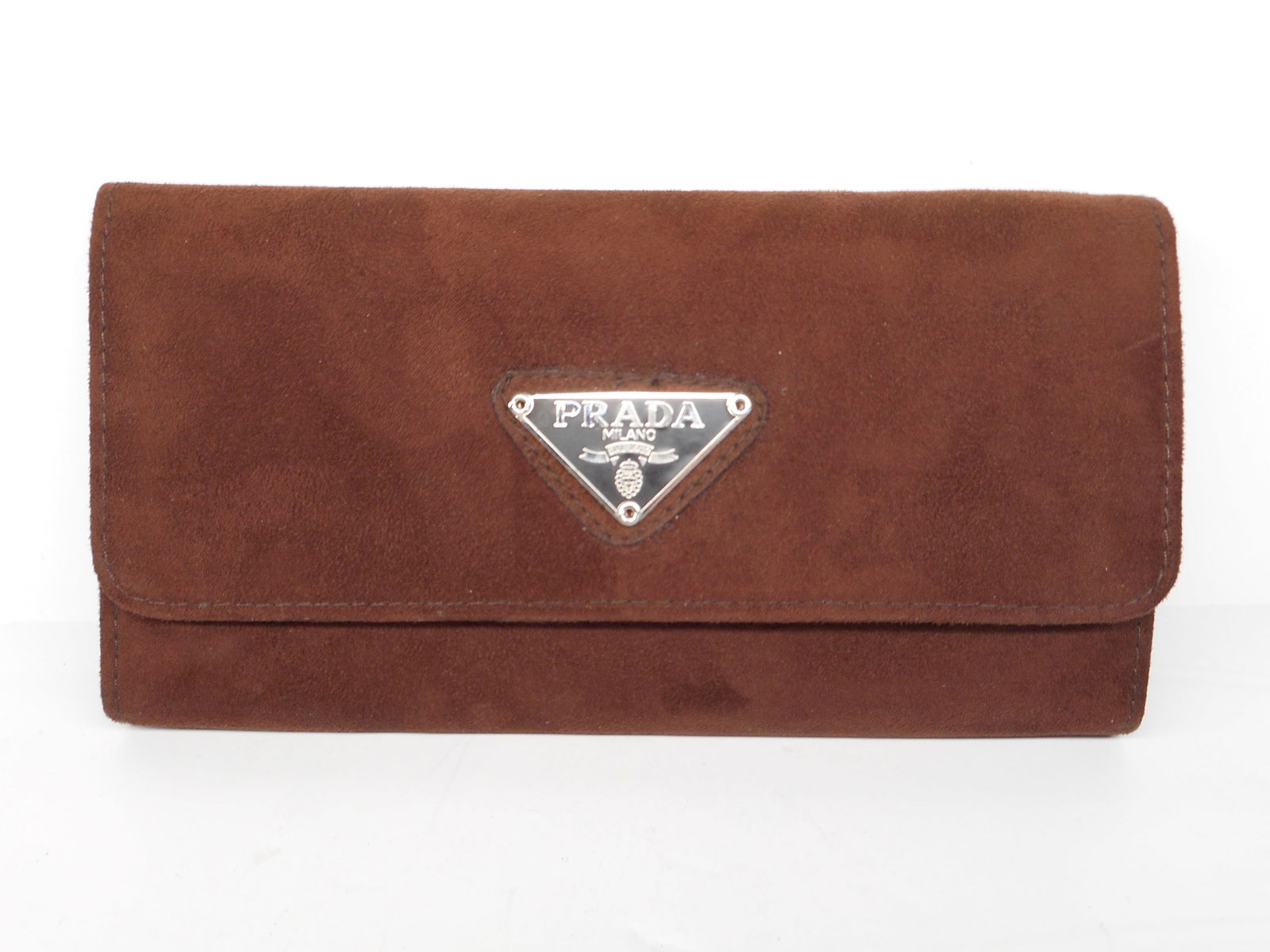 Brown Suede Scamosciato Long BiFold wallet with Snap Closure and Prada Metal logo, 7.5 inches: no COA Bidding on this item will be indication that the Bidder acknowledges that they have read and agreed to the Terms and Conditions posted to this Auction