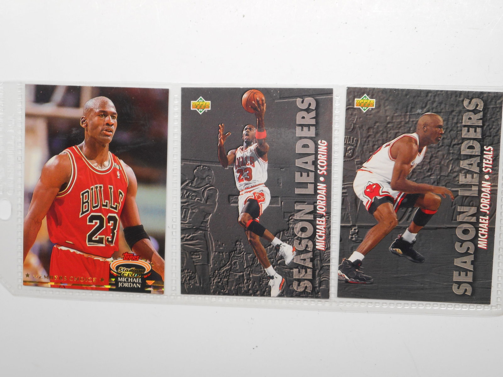 Michael Jordan Basketball Trading Cards, Topps and Upper Deck, Scoring, Steals, Stadium Club: stored in plastic sleeve as shown Bidding on this item will be indication that the Bidder acknowledges that they have read and agreed to the Terms and Conditions posted to this Auction