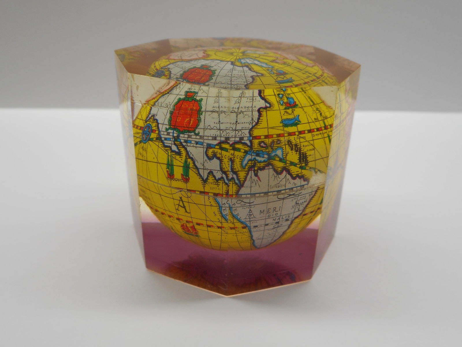Lucite Octagon with Globe inside, paperweight, desk decor, 2 x 2 inches: Bidding on this item will be indication that the Bidder acknowledges that they have read and agreed to the Terms and Conditions posted to this Auction