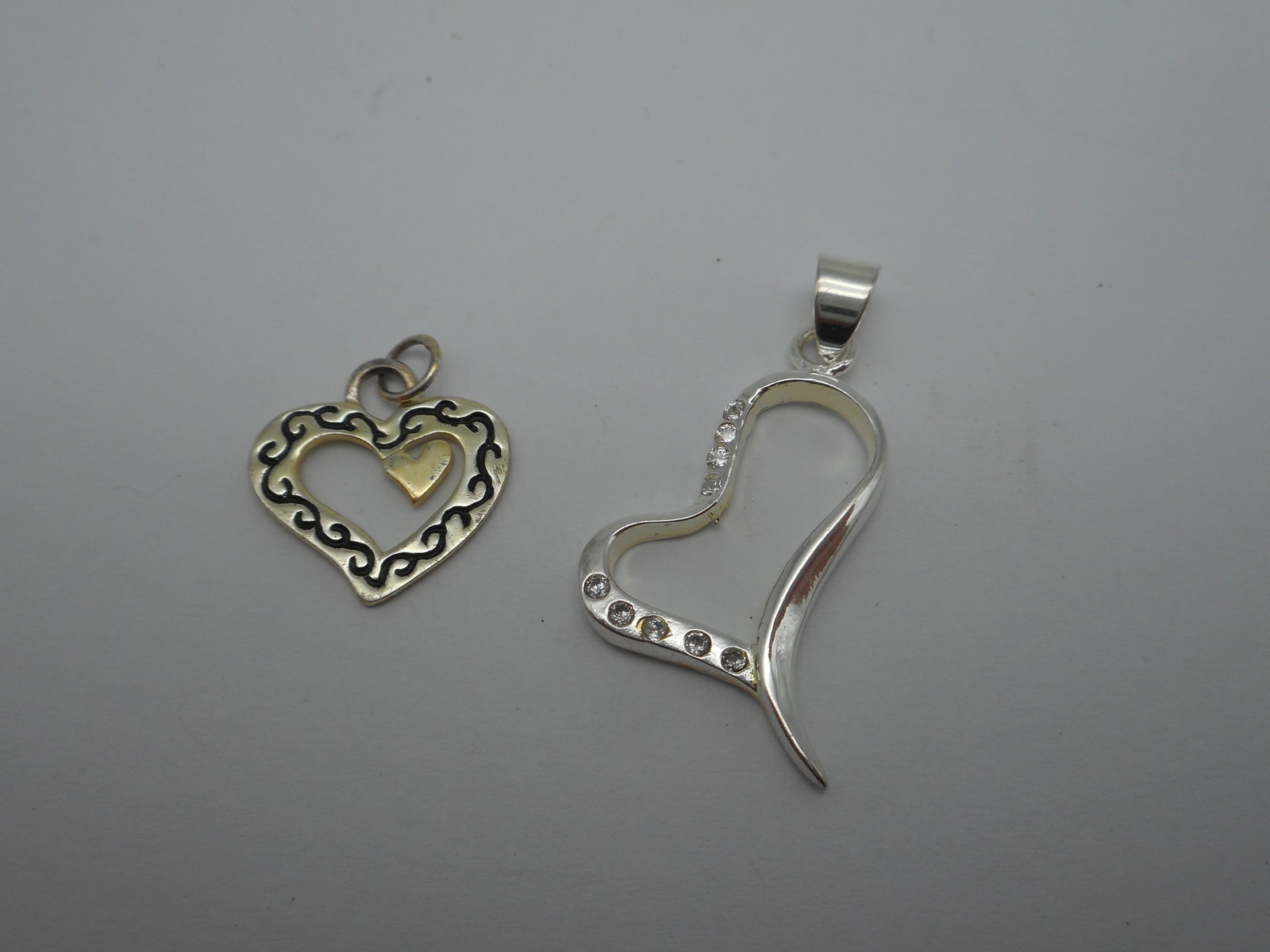 Two Silver Open Heart Designed Charms, Marked 925, Grandma Gift, Love, Art Deco Heart Pendants: Heart with stones is 1 inch, Grandma heart is 5/8 inch Bidding on this item will be indication that the Bidder acknowledges that they have read and agreed to the Terms and Conditions posted to this Au
