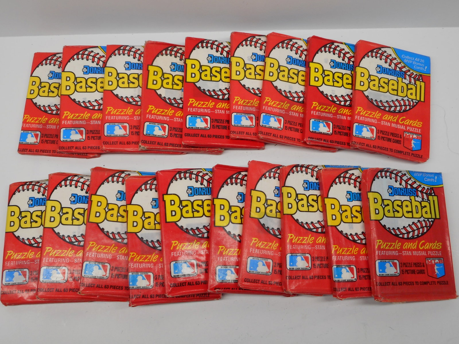 1988 Sealed Don Russ Baseball Puzzle and Cards Packs, Feat. Stan Musial Puzzle: some wrappers are worn and some tears, peeling open due to age Bidding on this item will be indication that the Bidder acknowledges that they have read and agreed to the Terms and Conditions posted to
