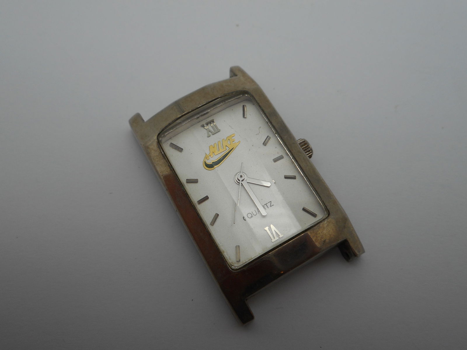 Rare Vintage NIKE Rectangular Watch Face (no band), No.2000, beveled glass,1.25 inches, Made in USA: needs battery Bidding on this item will be indication that the Bidder acknowledges that they have read and agreed to the Terms and Conditions posted to this Auction