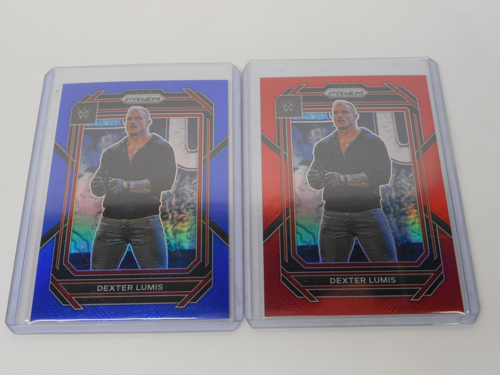 Two Limited Edition WWE Pro Wrestler DEXTER LUMIS Foil Prizm Trading Cards, in Top Loader Sleeves (1 of 5)