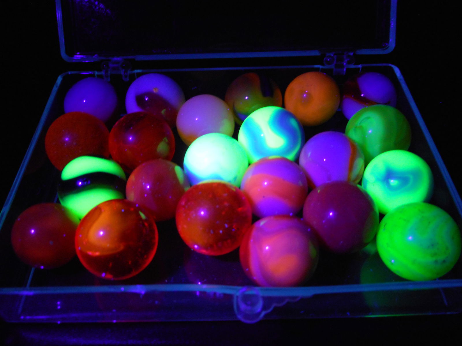 Awesome Collection of Vintage Glass Marbles with Radioactive Uranium and Cadmium Glow: photos under strong black light Bidding on this item will be indication that the Bidder acknowledges that they have read and agreed to the Terms and Conditions posted to this Auction