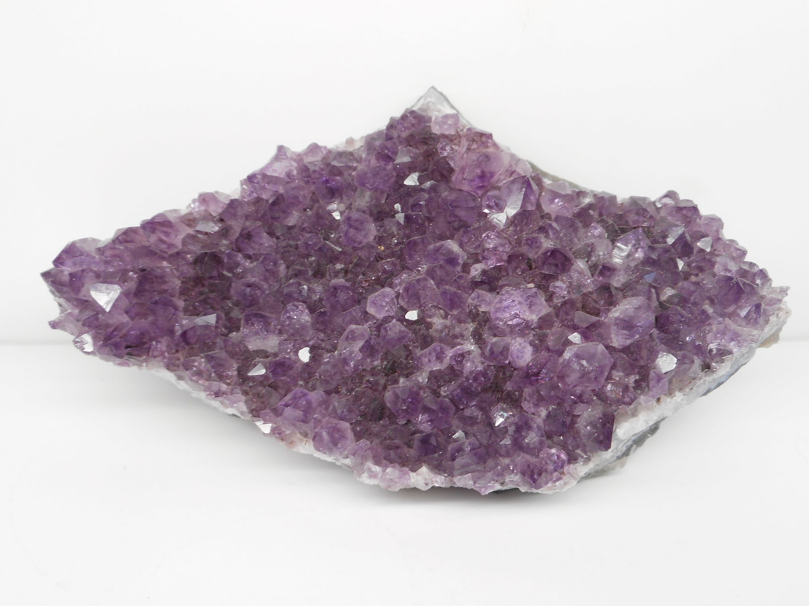 Nice chunk of Amethyst Geode in Matrix, 5.5 inches long, 14+ ounces: Bidding on this item will be indication that the Bidder acknowledges that they have read and agreed to the Terms and Conditions posted to this Auction