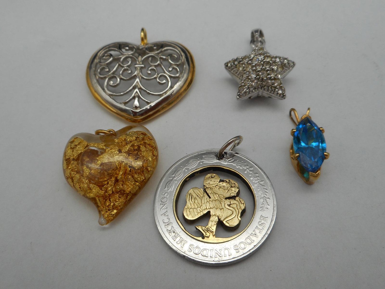 Pendant Lot - Acrylic Heart with Gold Leaf Flakes, Shamrock Cut from Coin, Rhinestones, and more: Bidding on this item will be indication that the Bidder acknowledges that they have read and agreed to the Terms and Conditions posted to this Auction