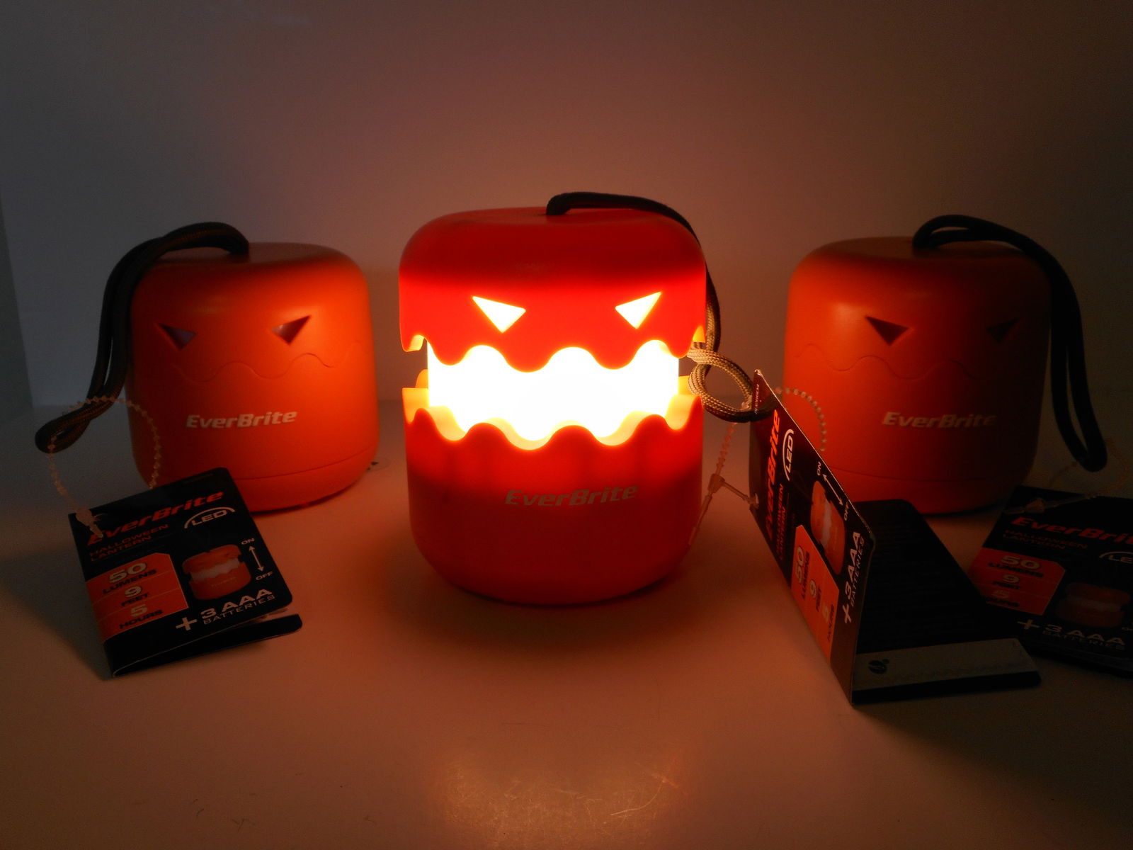 Three New Jack-O-Lantern Halloween Safety LED Lanterns, Batteries Included, One tab pulled, Working (1 of 4)