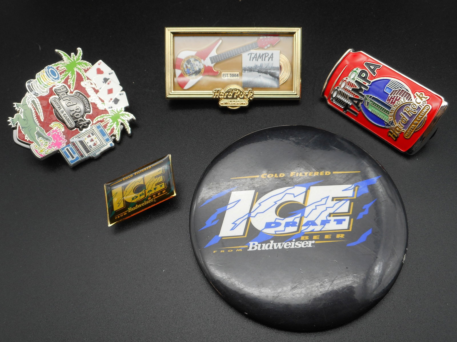 Budweiser ICE Large Button and Small Tac Pin, Tampa Hard Rock Casino Tac Pins: Bidding on this item will be indication that the Bidder acknowledges that they have read and agreed to the Terms and Conditions posted to this Auction