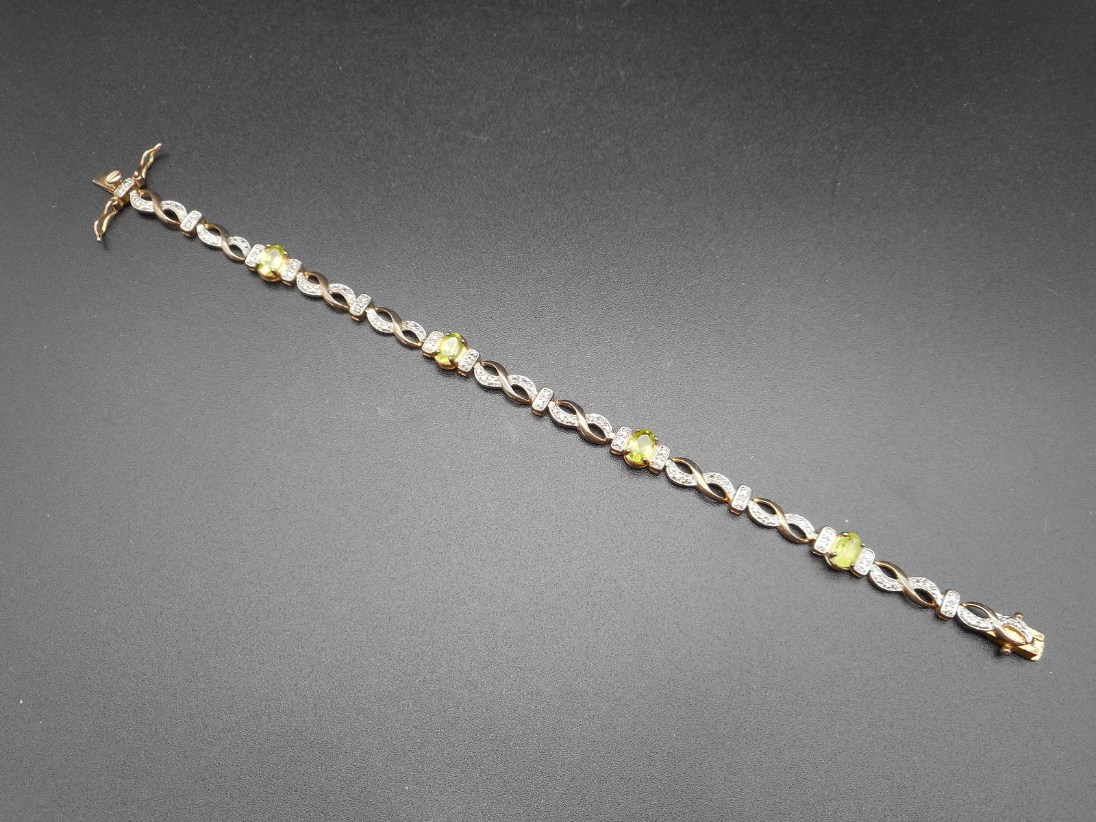 Elegant Infinity Link Bracelet, Sterling 925, Oval Cut Peridot with Clear Stone Accents, 7.5 inches (1 of 5)