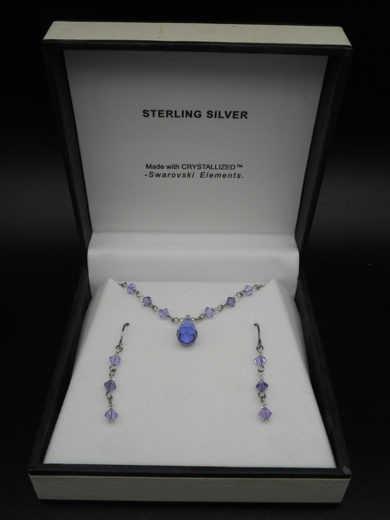 New In Box - Sterling Silver Swarovski Lavender Crystallized Elements Necklace and Earring Set: Bidding on this item will be indication that the Bidder acknowledges that they have read and agreed to the Terms and Conditions posted to this Auction