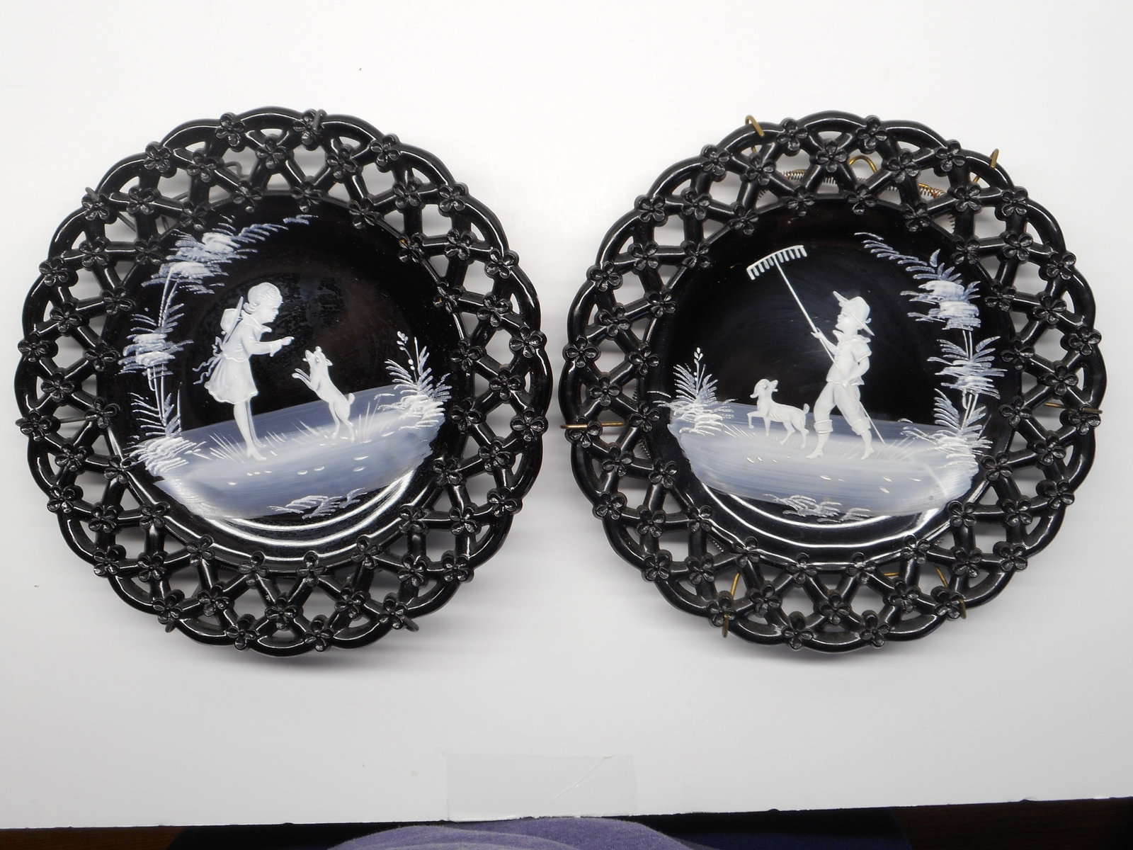 Pair of Black Westmoreland Glass Co. Reticulated Mary Gregory Style, 8.5 inches, with Wall Mounts: Bidding on this item will be indication that the Bidder acknowledges that they have read and agreed to the Terms and Conditions posted to this Auction