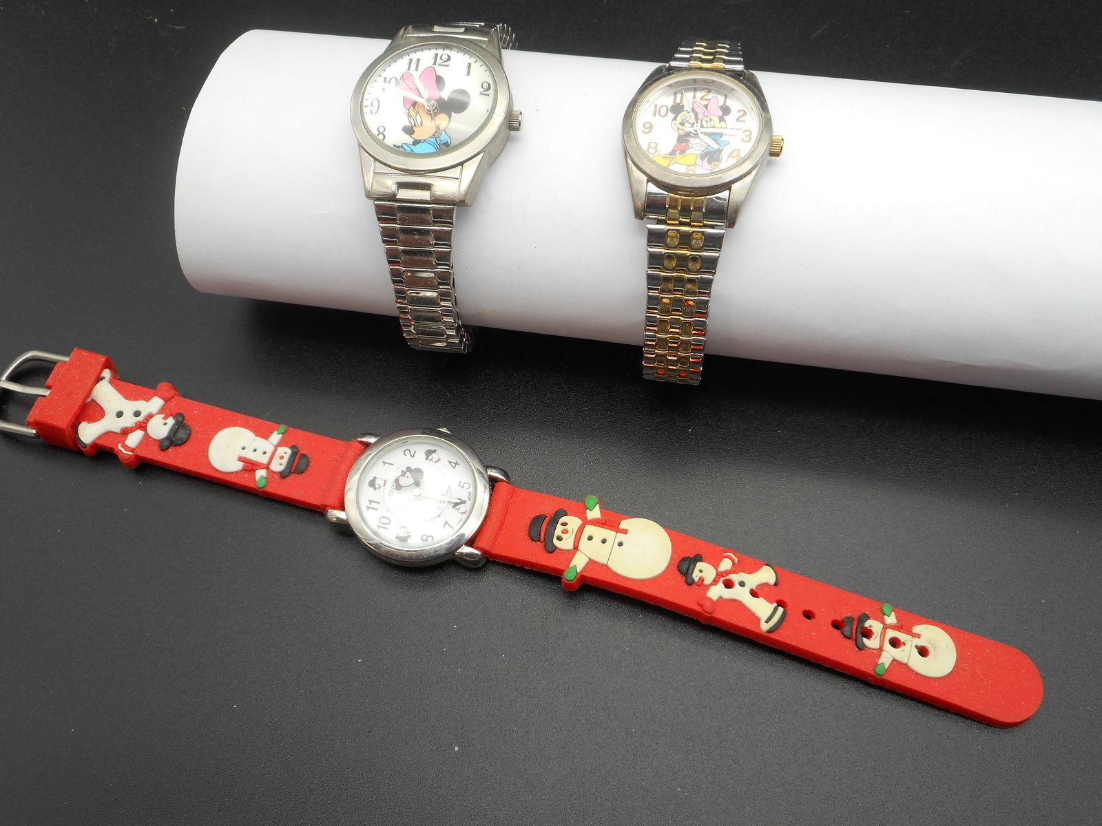 Mickey and Minnie Mouse Expandable Band Watches & Frosty the Snowman Whimsical Watch: need batteries Bidding on this item will be indication that the Bidder acknowledges that they have read and agreed to the Terms and Conditions posted to this Auction