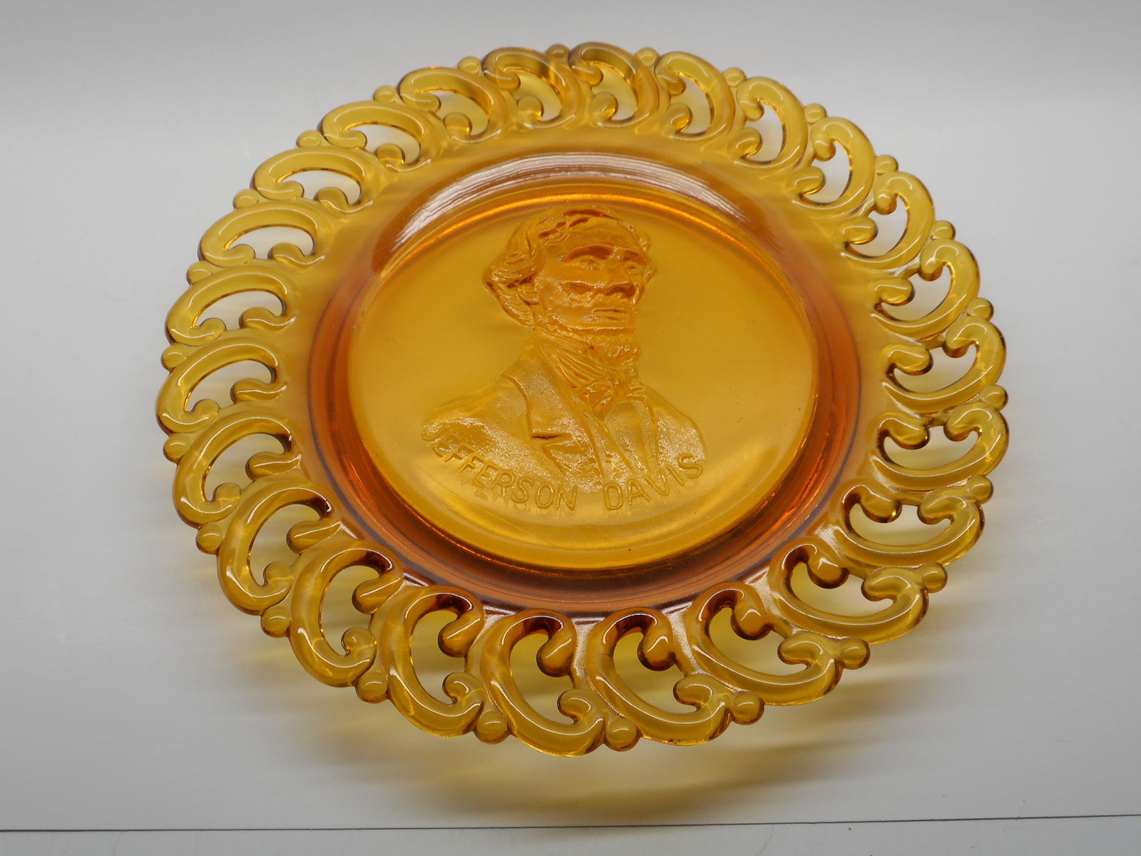 Amber Glass Plate with Relief Bust of Jefferson Davis, Ornate Edge, 9 inch diameter (1 of 4)