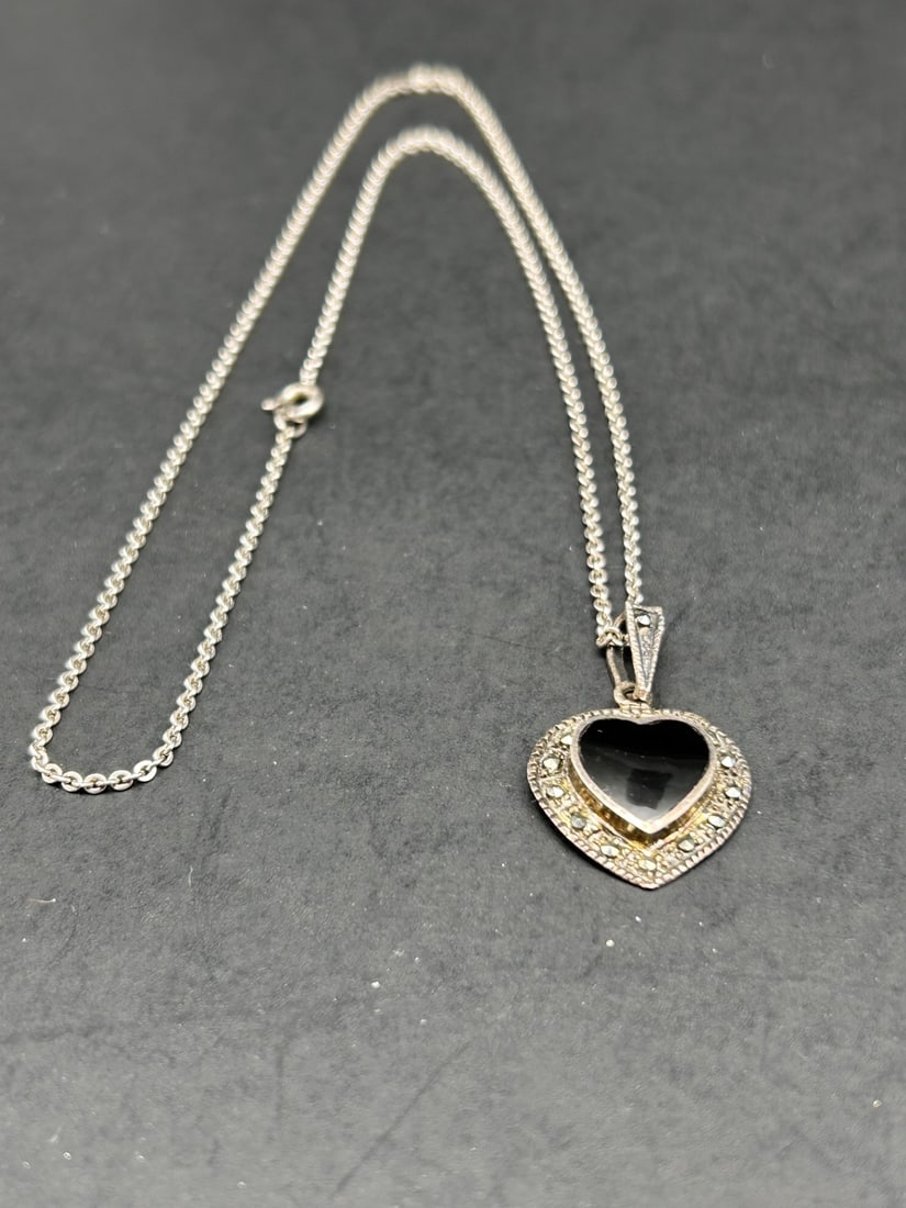 Smooth Onyx Heart and Marcasite Silver Pendant on 18 inch Necklace, Marked 925: Bidding on this item will be indication that the Bidder acknowledges that they have read and agreed to the Terms and Conditions posted to this Auction