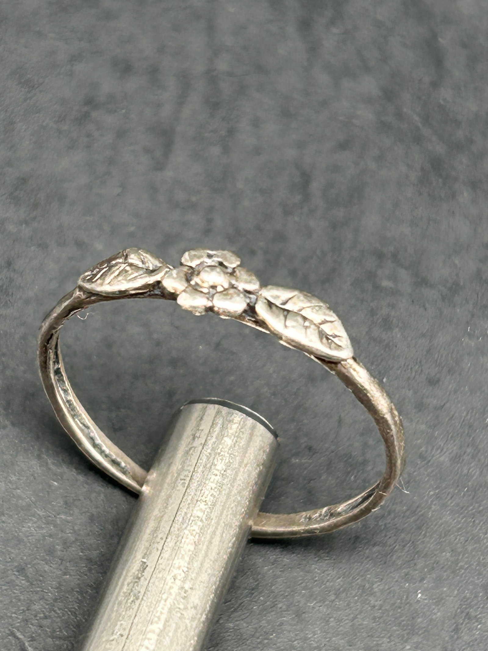 Dainty Single Flower with Leaves Sterling Silver Ring, Band Marked ISRAEL 925, Size 8.25: Bidding on this item will be indication that the Bidder acknowledges that they have read and agreed to the Terms and Conditions posted to this Auction