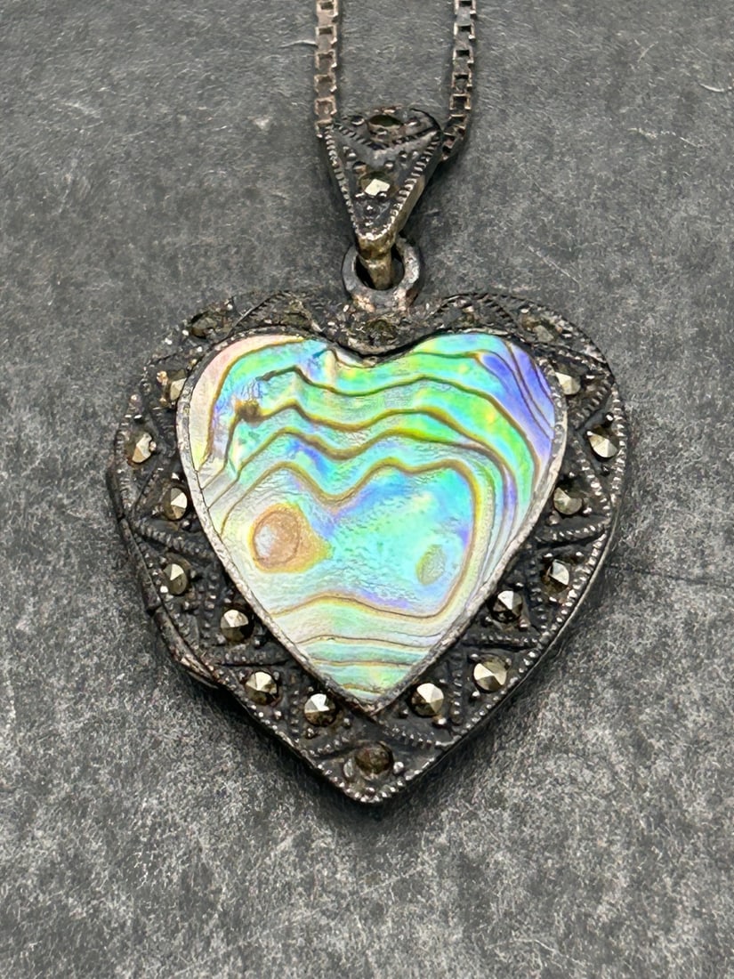 Heart Locket, Abalone and Marcasite Design, Sterling Silver, Marked 925, Chain is 24 inches: Bidding on this item will be indication that the Bidder acknowledges that they have read and agreed to the Terms and Conditions posted to this Auction