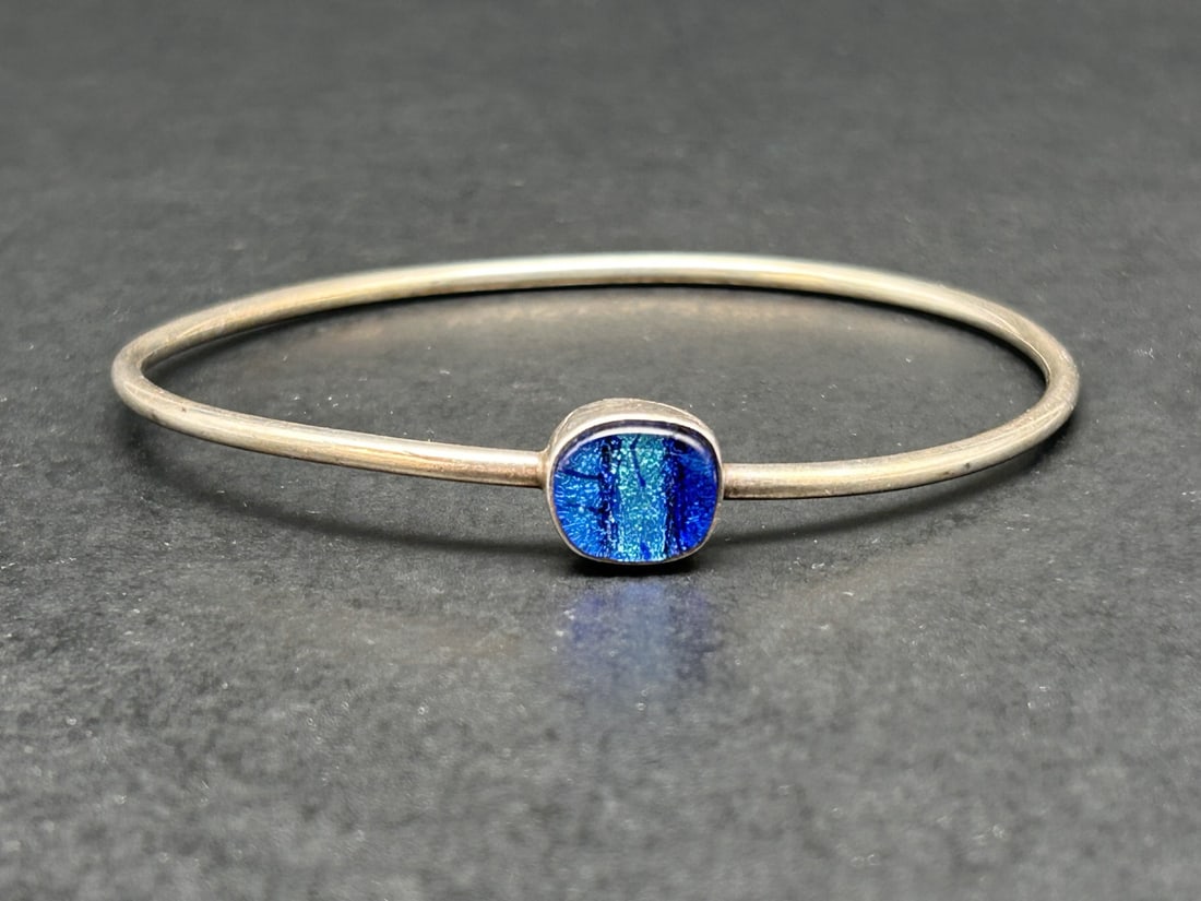 Pearlized Blue Art Glass Sterling Silver Closed Bangle Bracelet, Wrist Width 2.75 inches: Bidding on this item will be indication that the Bidder acknowledges that they have read and agreed to the Terms and Conditions posted to this Auction