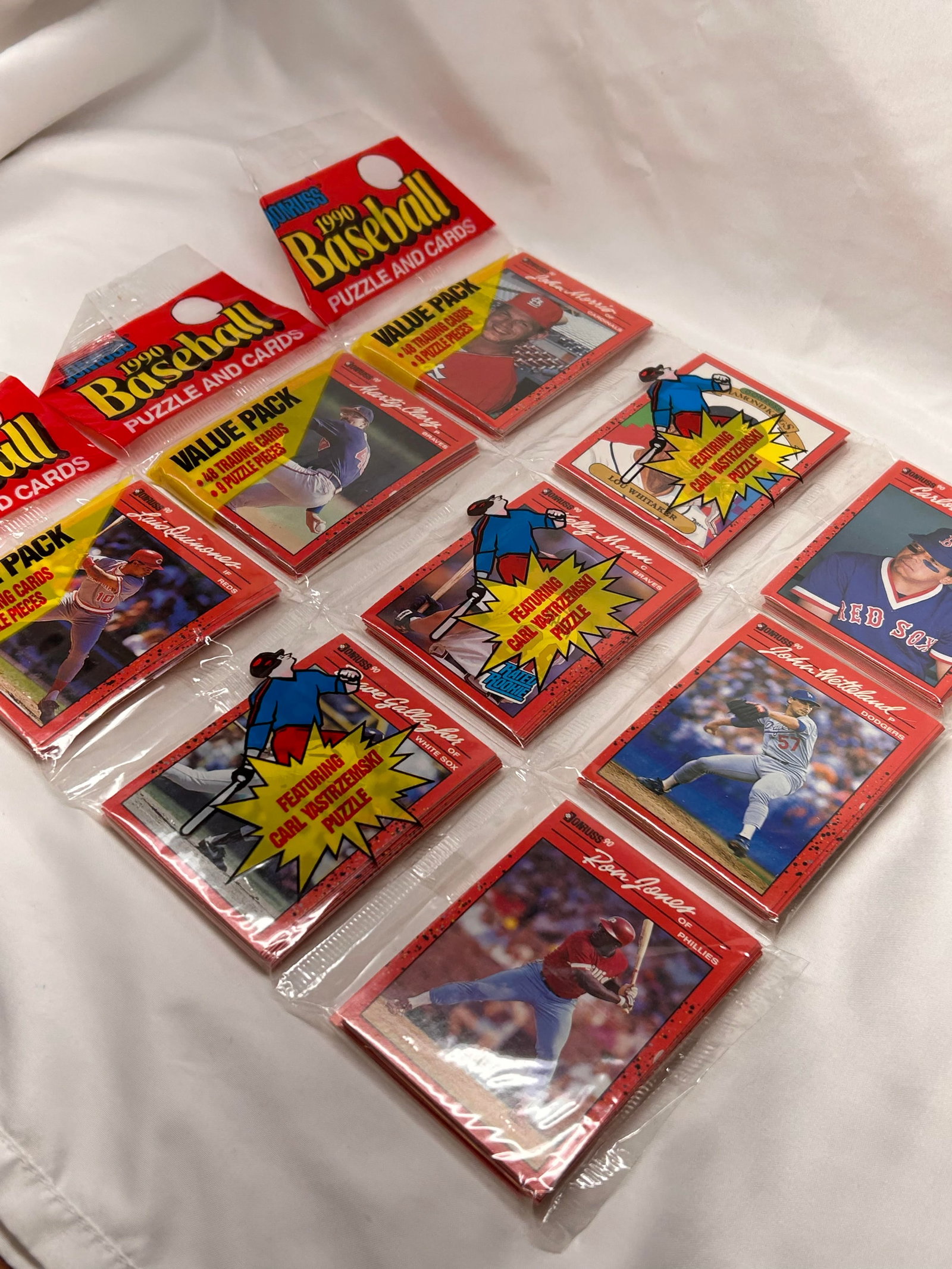 Value Packs of 1990 Don Russ Baseball Cards & Puzzle, NIP, 3 Packs, Each 48 cards & 9 puzzle pieces: Bidding on this item will be indication that the Bidder acknowledges that they have read and agreed to the Terms and Conditions posted to this Auction