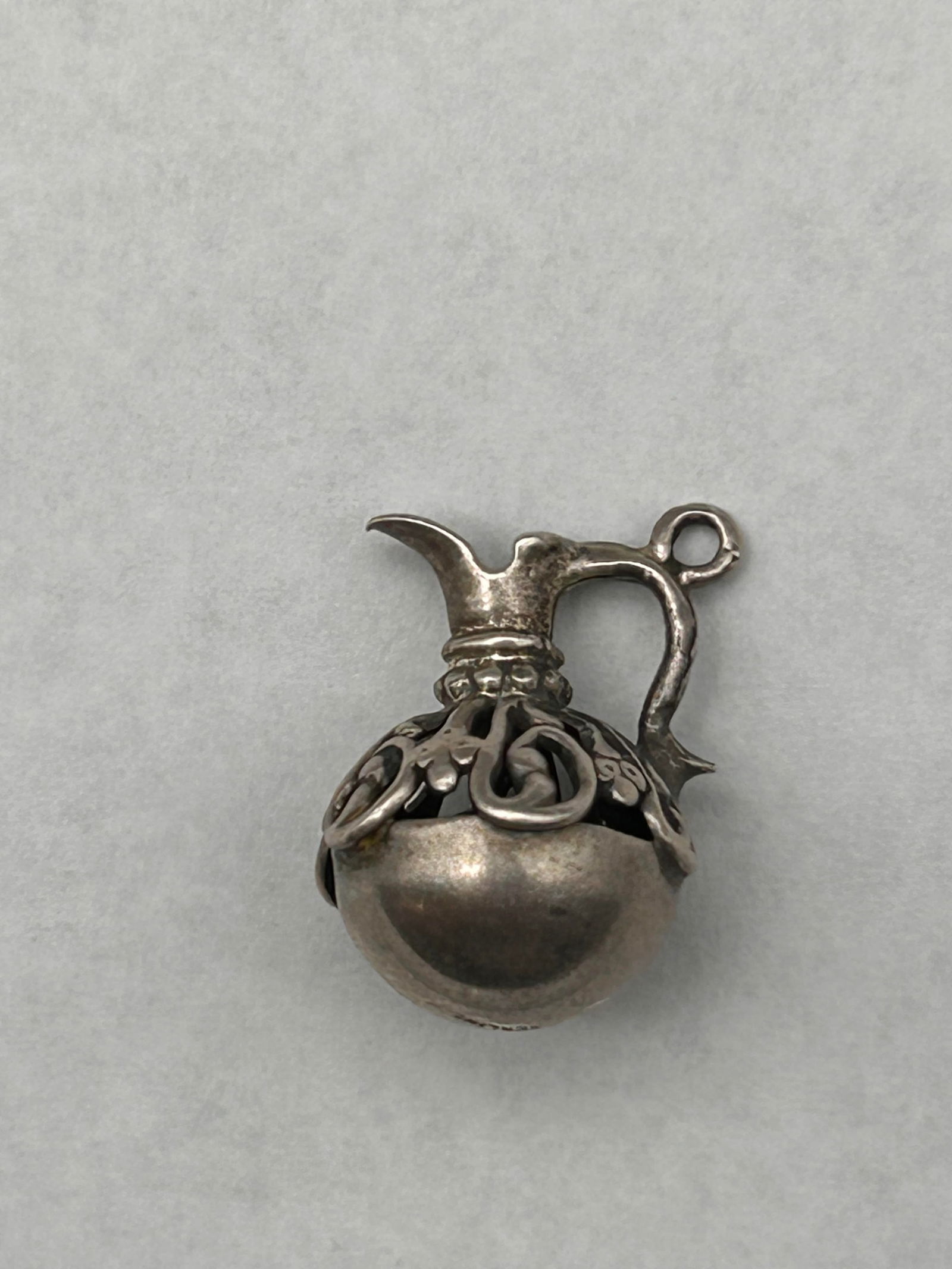 Sterling Silver Openwork Filigree Pitcher Charm, Water Bearer Jug Pendant, Marked Sterling, 3/4": Bidding on this item will be indication that the Bidder acknowledges that they have read and agreed to the Terms and Conditions posted to this Auction