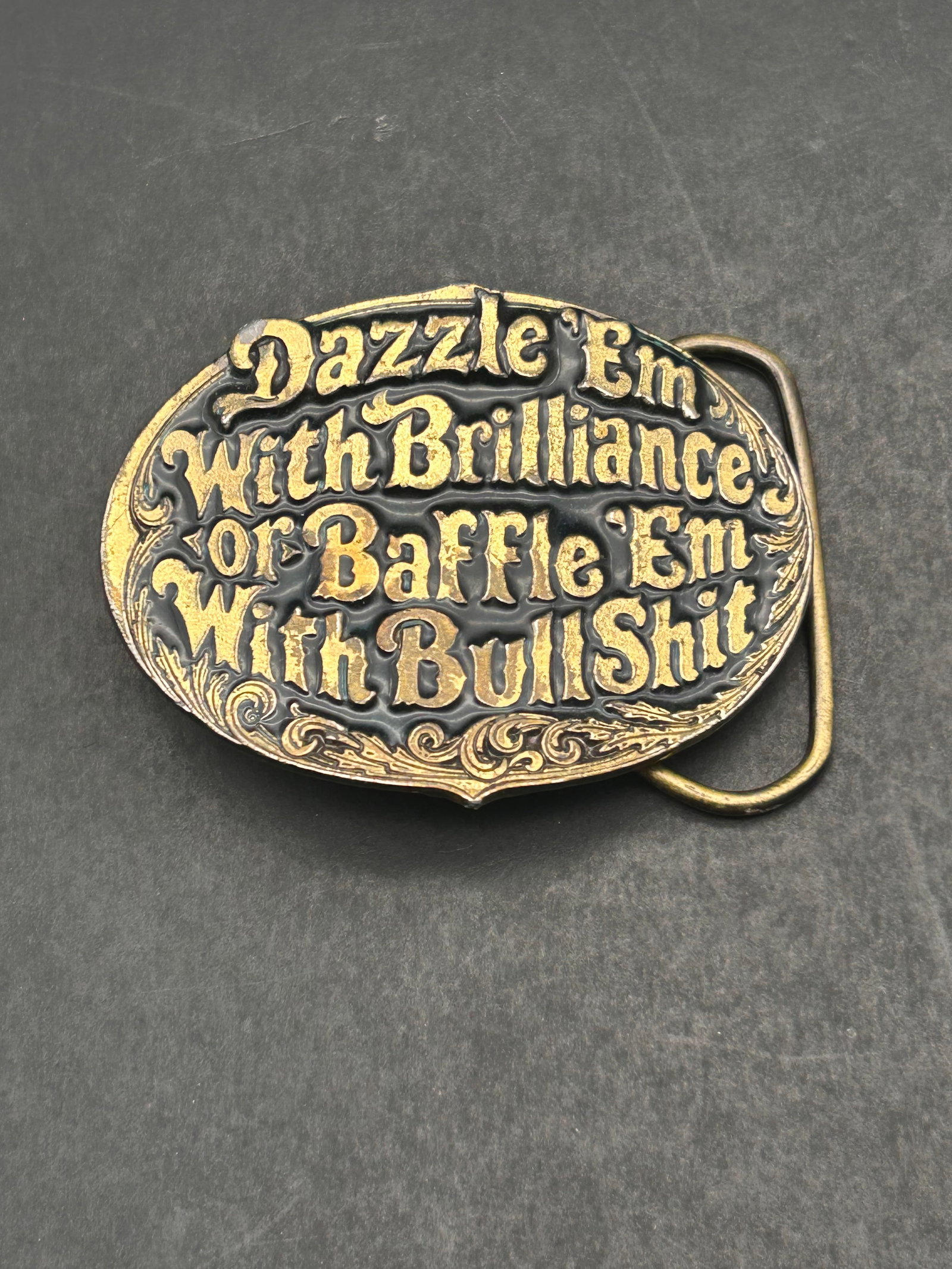 1981 Brass Belt Buckle, The Great American Buckle Co., 2.75", Dazzle 'Em With Brilliance Quote: Bidding on this item will be indication that the Bidder acknowledges that they have read and agreed to the Terms and Conditions posted to this Auction