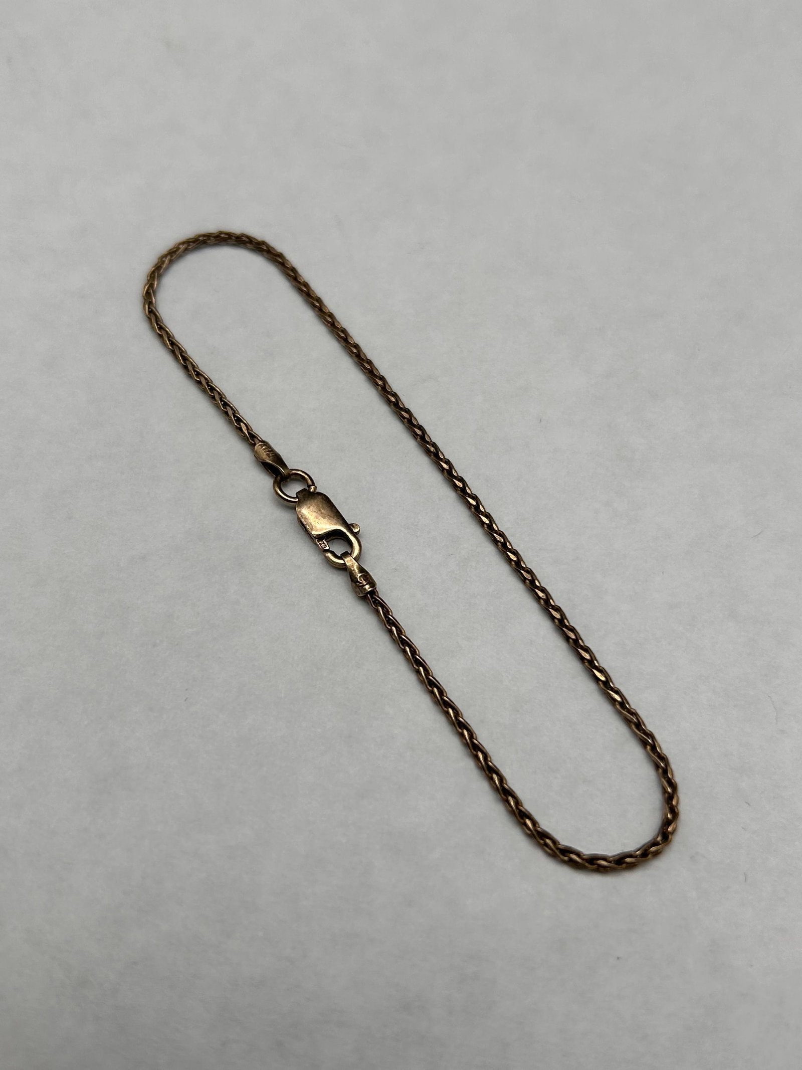 Wheat Link Sterling Silver Bracelet, Marked 925 Italy, Lobster Claw Clasp, 7" length: Bidding on this item will be indication that the Bidder acknowledges that they have read and agreed to the Terms and Conditions posted to this Auction