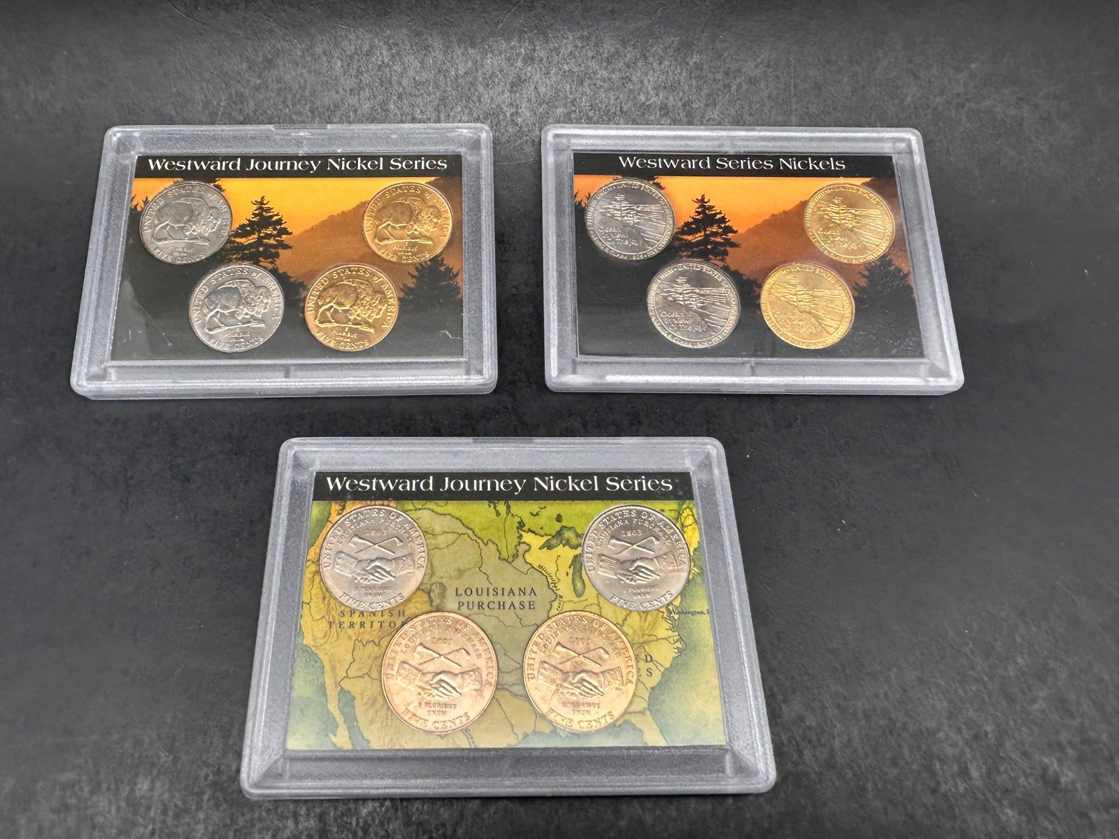 Three cases, 2004 & 2005 Westward Journey Nickel Series, Whitman Publishing, Some Gold Plated: Bidding on this item will be indication that the Bidder acknowledges that they have read and agreed to the Terms and Conditions posted to this Auction