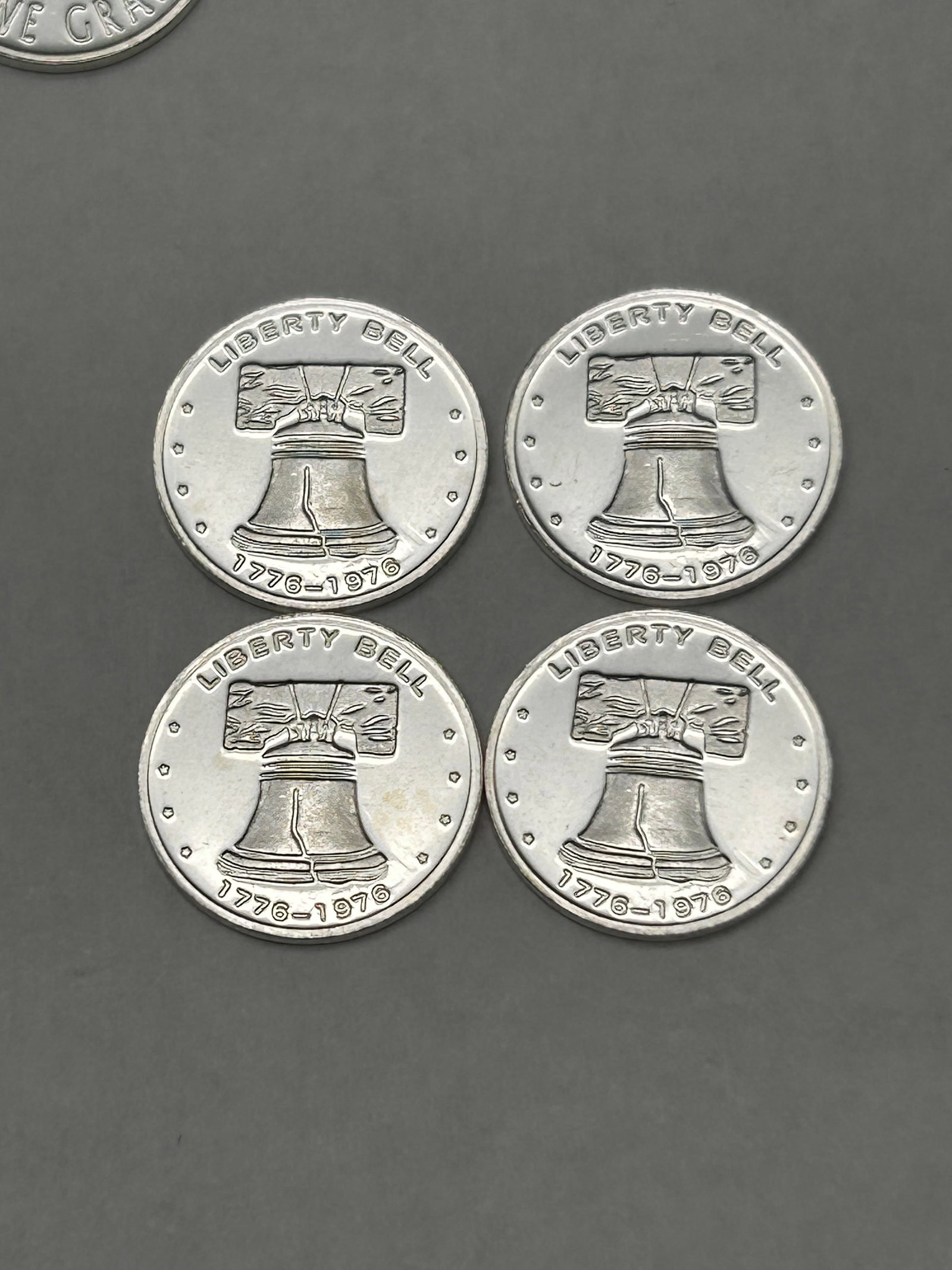 4 Liberty Bell 200th anniversary Coins - Each 1g .999 FIne Silver, 4g total: Bidding on this item will be indication that the Bidder acknowledges that they have read and agreed to the Terms and Conditions posted to this Auction