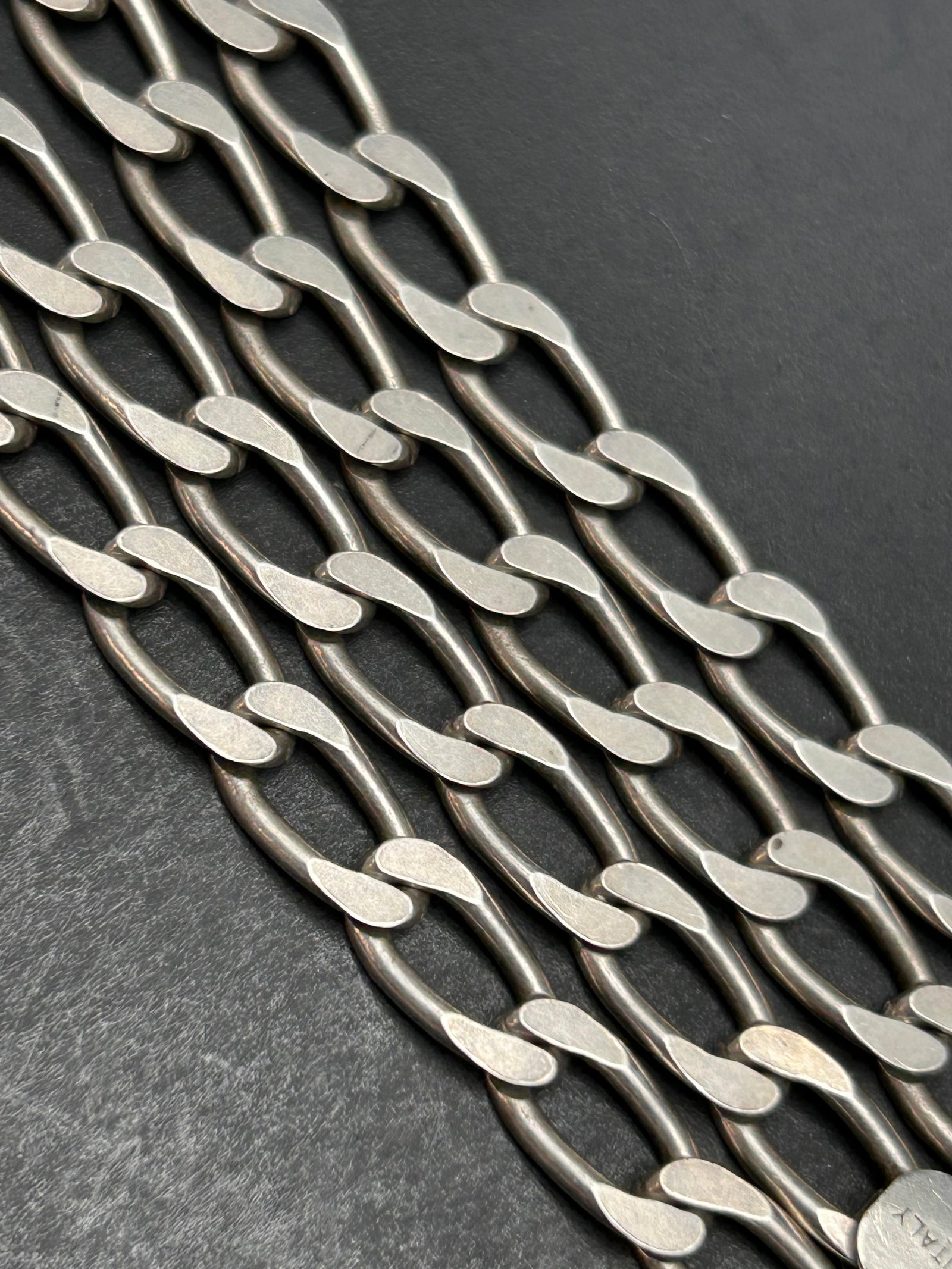 Sterling Silver Figaro Link Necklace, Chain Marked 925 Italy, Designer HCT, 24" Long: Bidding on this item will be indication that the Bidder acknowledges that they have read and agreed to the Terms and Conditions posted to this Auction