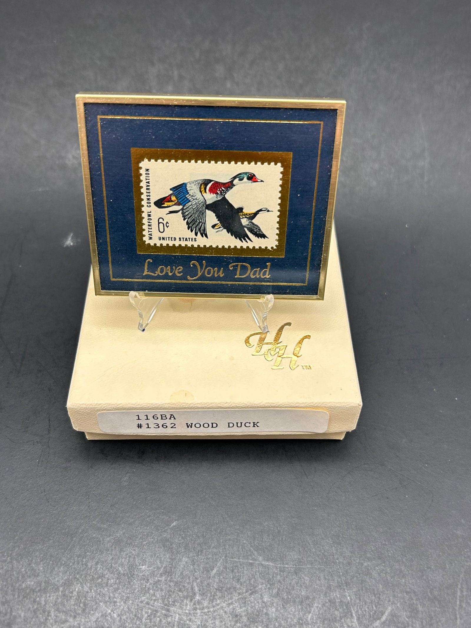 Limited Edition Framed & Matted Waterfowl Conservation Stamp, Wood Duck, Love you Dad, 1968: Easel Included, Frame dims 2.25 x 2.75" Bidding on this item will be indication that the Bidder acknowledges that they have read and agreed to the Terms and Conditions posted to this Auction