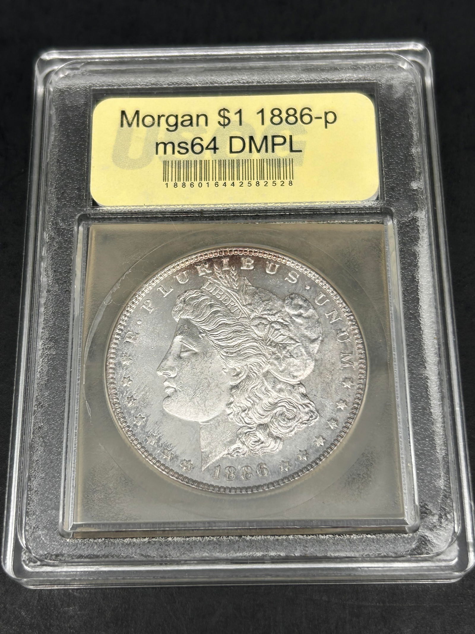 1886-P Morgan Dollar, $1, Graded by USCG, US Coin Grading, MS-64 DMPL (1 of 4)
