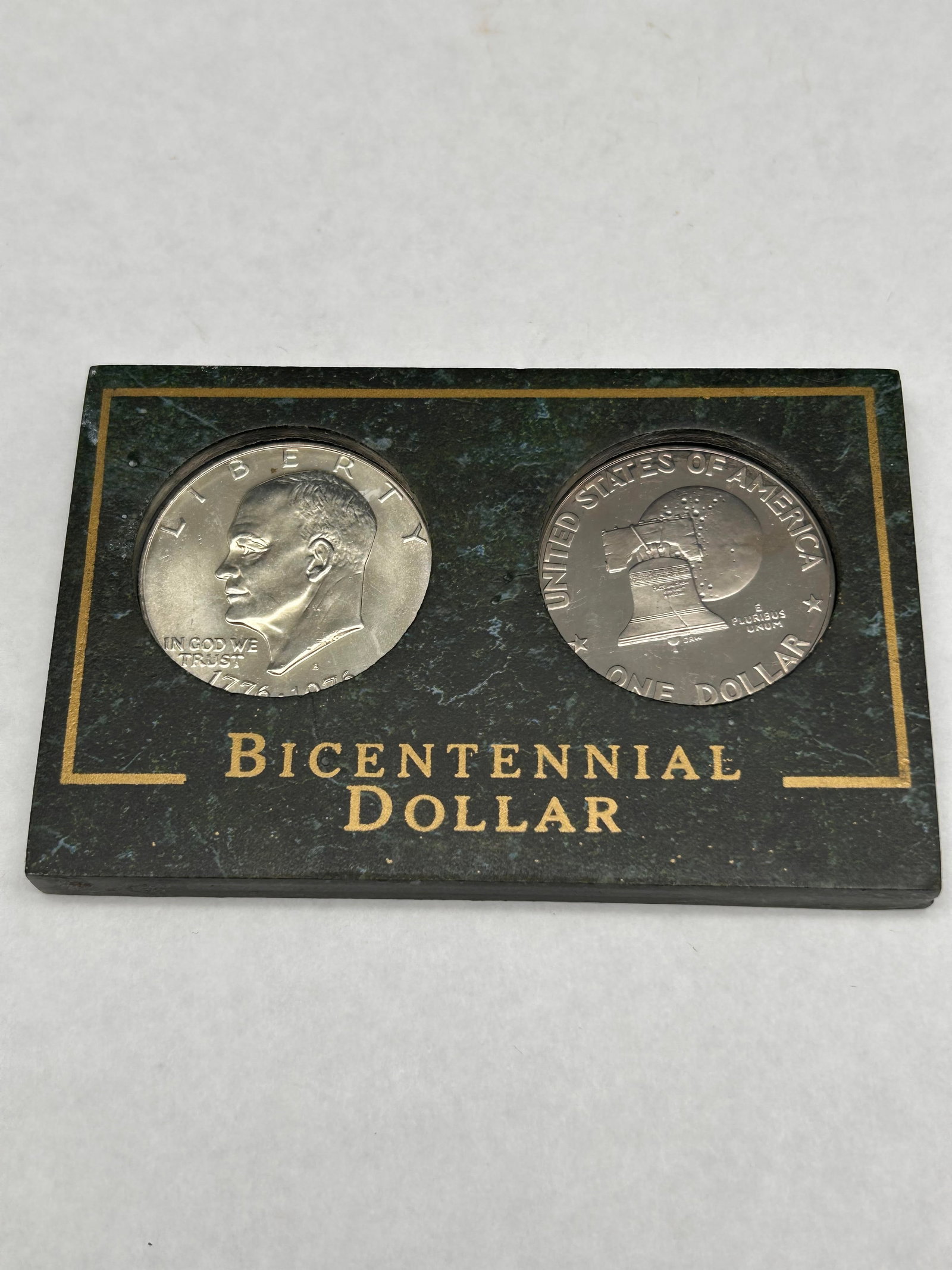 1976 United States Bicentennial Dollar set in a display case, 1776-1976, 2 x One Dollar Coins: Bidding on this item will be indication that the Bidder acknowledges that they have read and agreed to the Terms and Conditions posted to this Auction