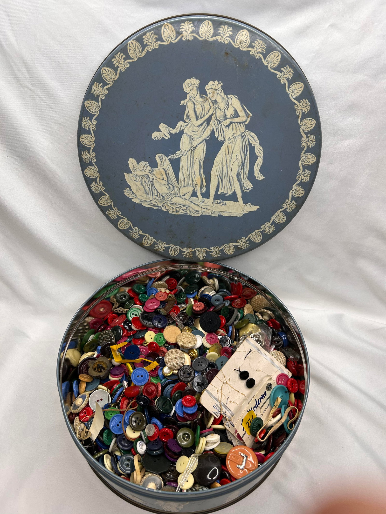 Massive Old Button Collection Stored in Vintage Deer Park Baking Co Danish Cookie Tin, 10" Diameter: Bidding on this item will be indication that the Bidder acknowledges that they have read and agreed to the Terms and Conditions posted to this Auction
