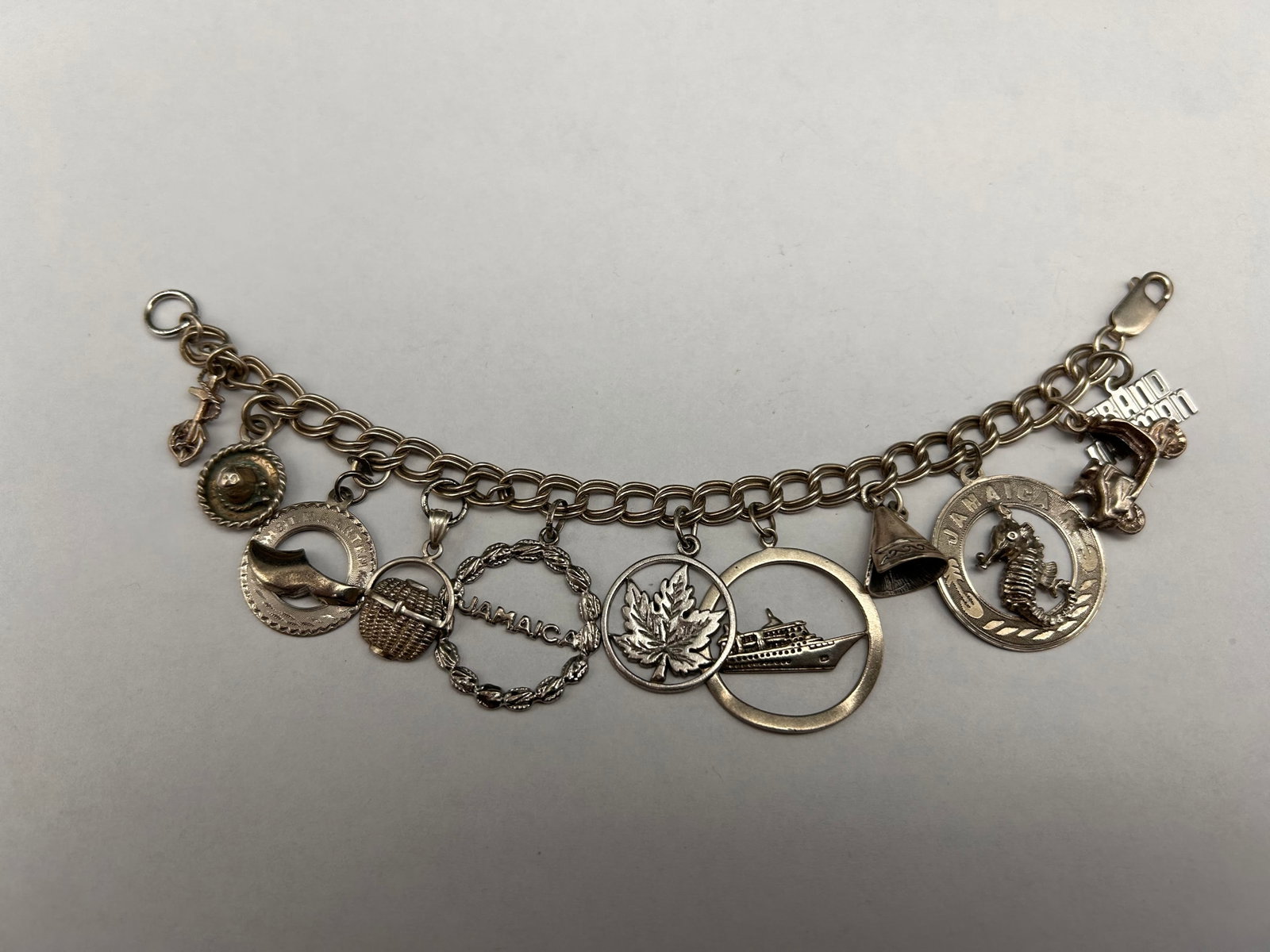 Sterling Silver Vacation Charm Bracelet - incl. Jamaica, Mexico & More, All 925, 7" length: Bidding on this item will be indication that the Bidder acknowledges that they have read and agreed to the Terms and Conditions posted to this Auction