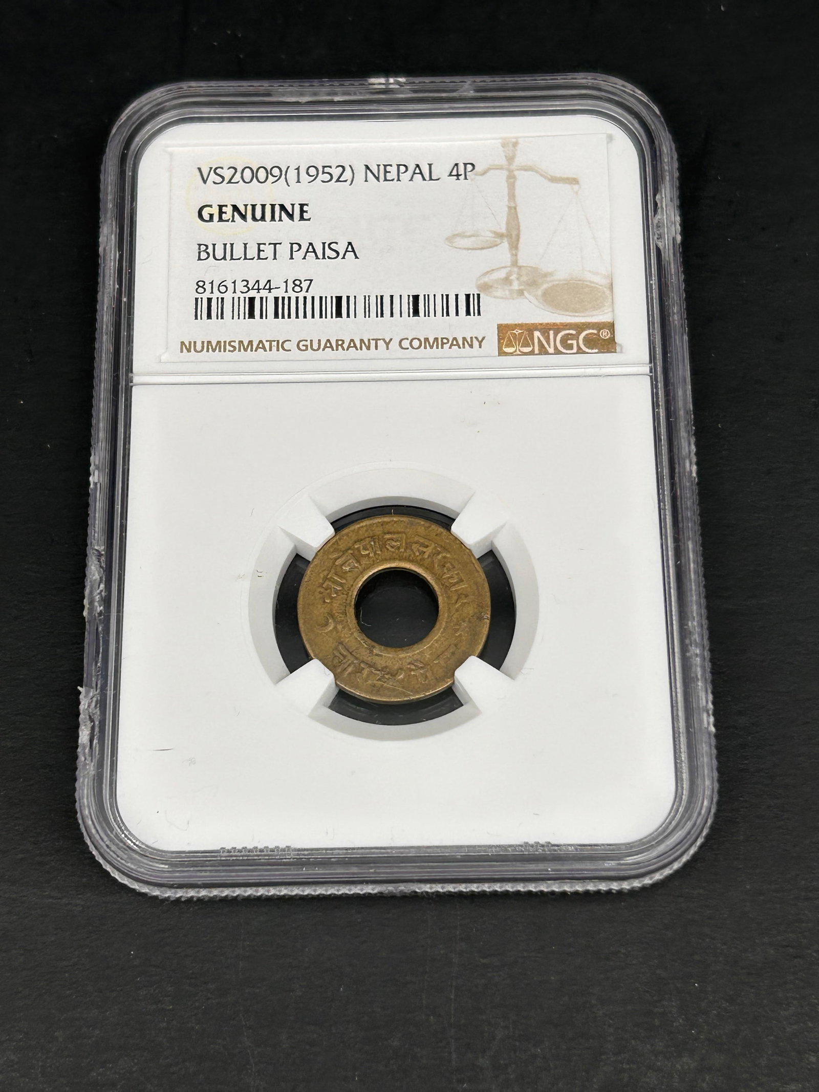NGC Genuine Bullet Paisa VS2009 (1952) Nepal 4P: Bidding on this item will be indication that the Bidder acknowledges that they have read and agreed to the Terms and Conditions posted to this Auction