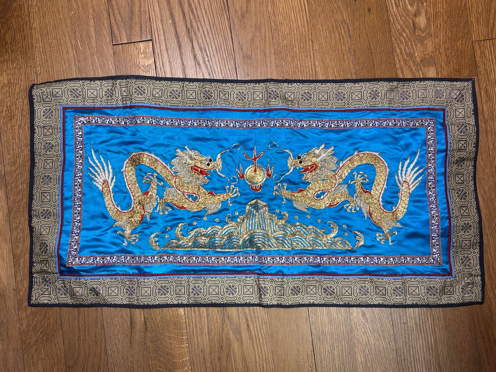 Chinese Metal and Silk Gold Embroidered Teal Panel, Two Dragons, 25" x 12.5": Bidding on this item will be indication that the Bidder acknowledges that they have read and agreed to the Terms and Conditions posted to this Auction
