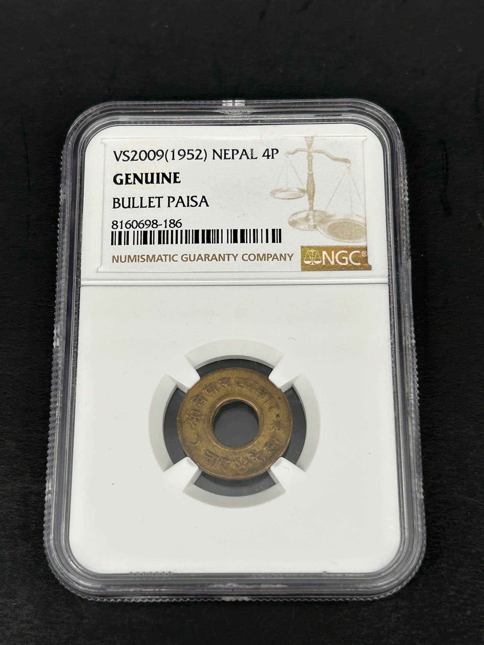 GENUINE VS2009 (1952) Nepal 4P Bullet Paisa, NGC Genuine 4 Paisa: Bidding on this item will be indication that the Bidder acknowledges that they have read and agreed to the Terms and Conditions posted to this Auction