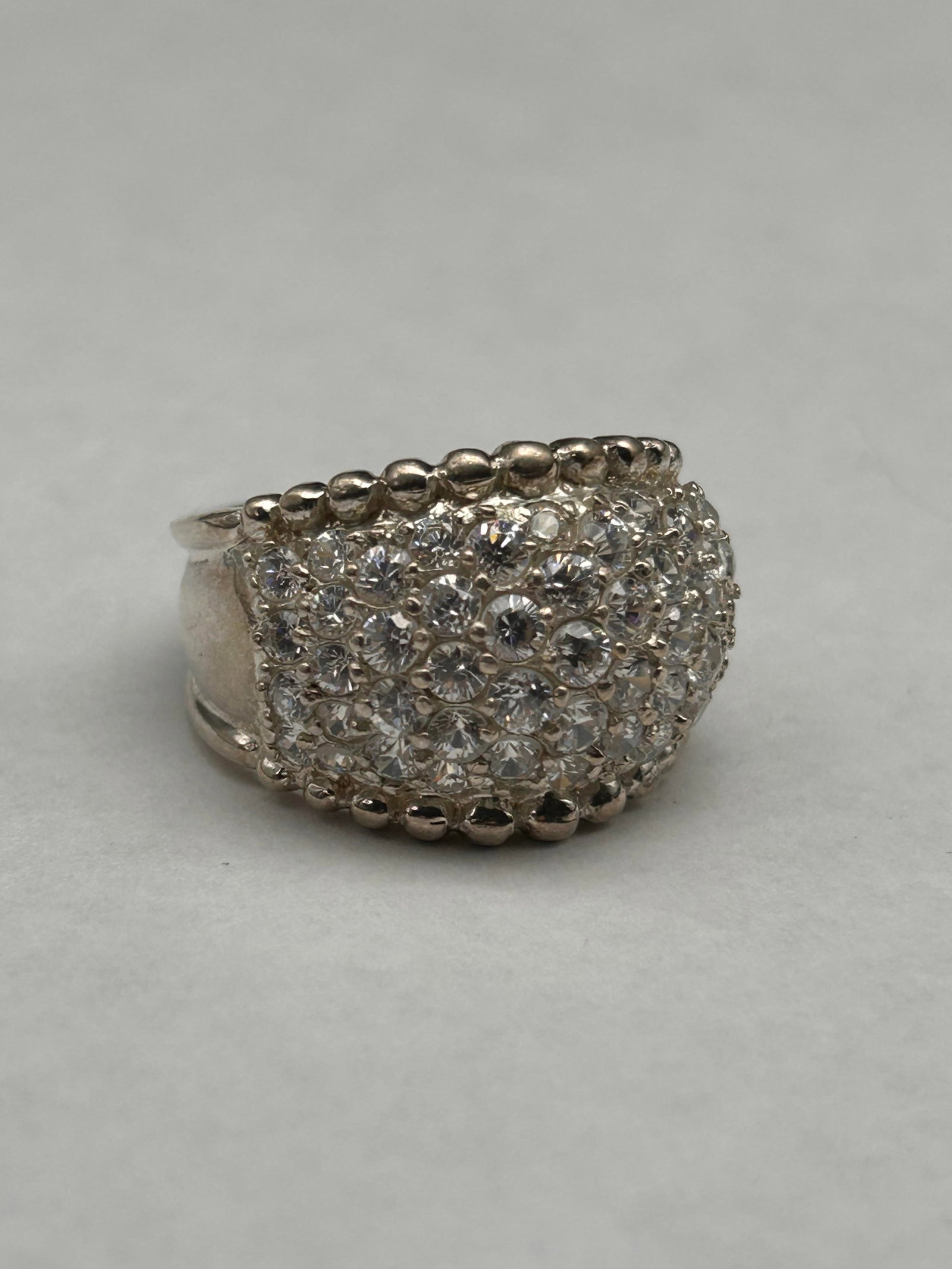 Sparkling Sterling Silver and CZ Cocktail Ring, Marked 925, Size 9: Bidding on this item will be indication that the Bidder acknowledges that they have read and agreed to the Terms and Conditions posted to this Auction