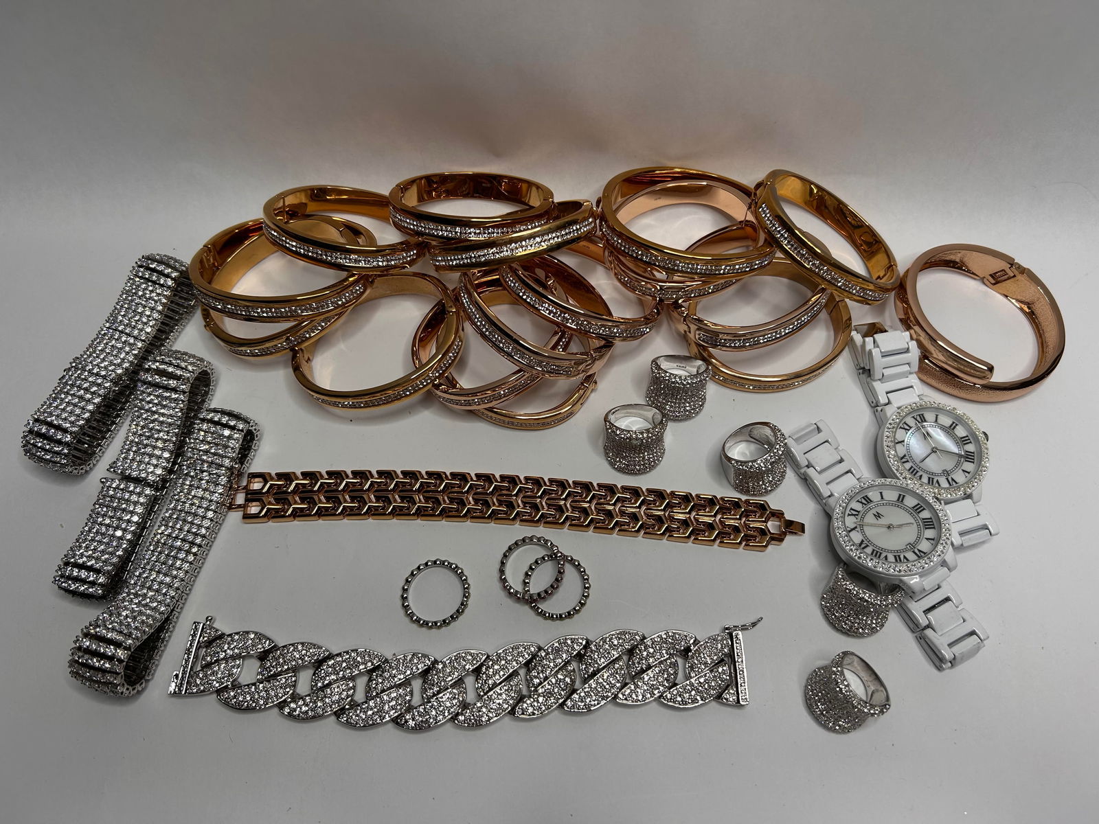 Gorgeous Assortment of Sparkling Fashion Bracelets, Watches, and Rings, Multiples of Most Pieces: Bidding on this item will be indication that the Bidder acknowledges that they have read and agreed to the Terms and Conditions posted to this Auction