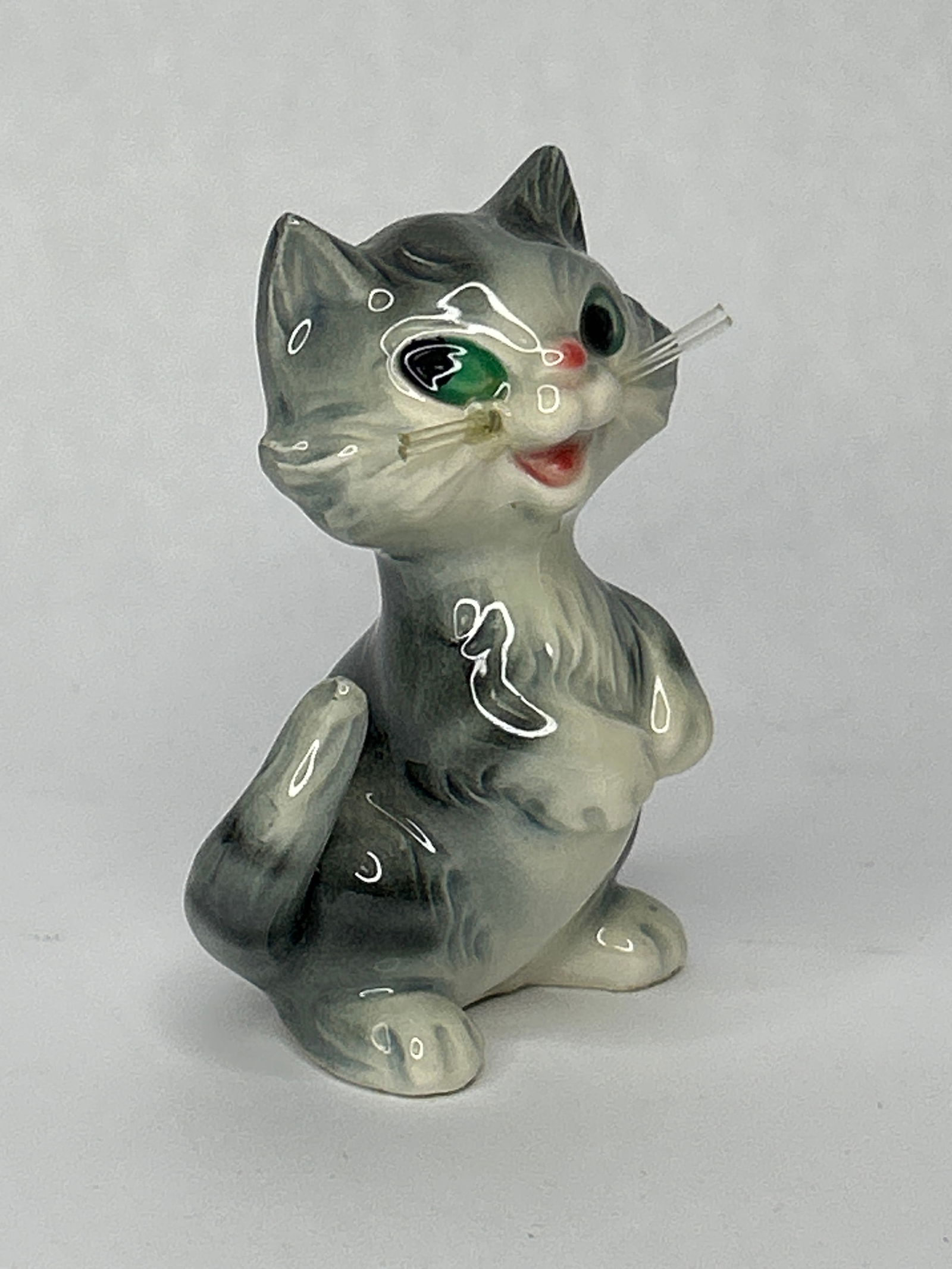 Collectible GOEBEL W. GERMANY Porcelain Gray Cat Figurine with Plastic Whiskers: Bidding on this item will be indication that the Bidder acknowledges that they have read and agreed to the Terms and Conditions posted to this Auction