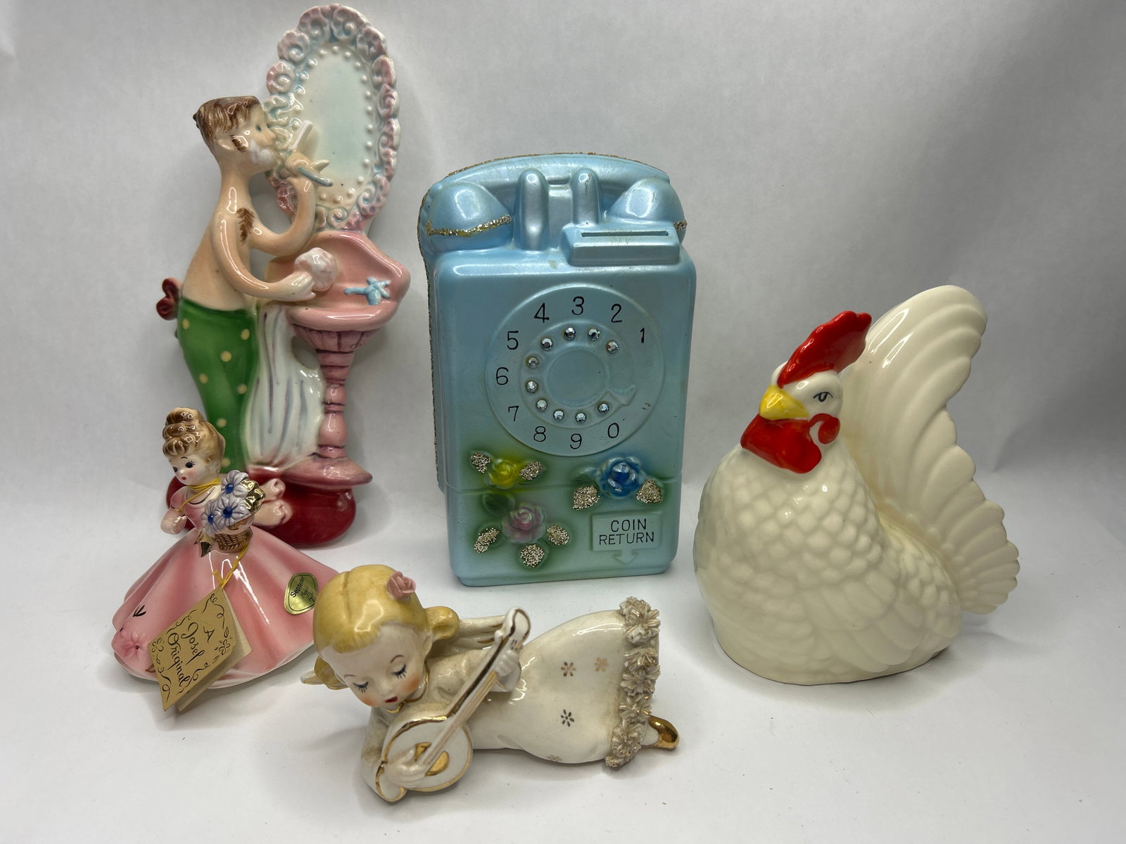 Shelf and Wall Decor incl. Payphone Bank, Tooth Brushing Wall Sculpture & Other Whimsical Figurines: Bidding on this item will be indication that the Bidder acknowledges that they have read and agreed to the Terms and Conditions posted to this Auction