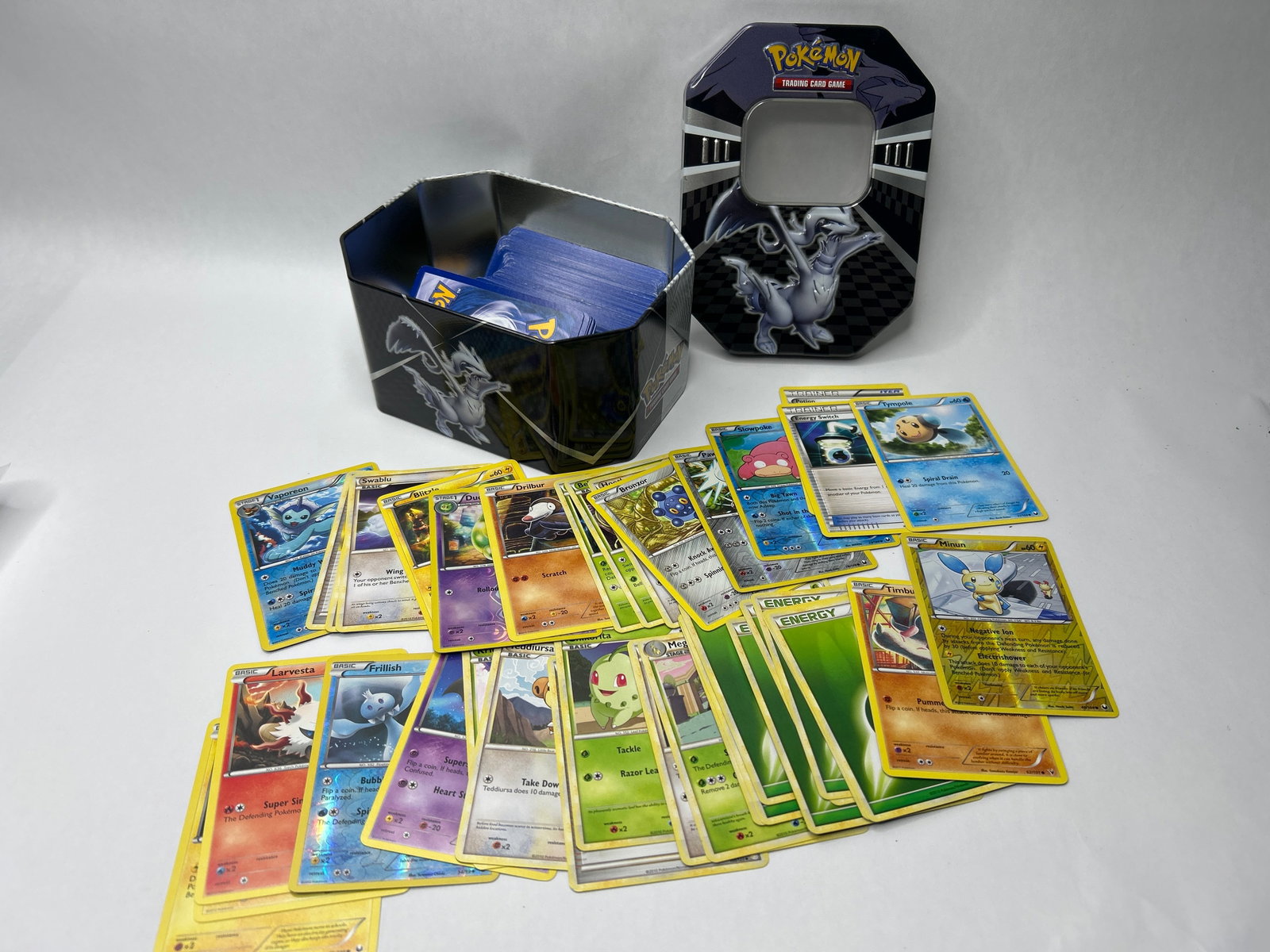POKEMON TCG New Legends Tin with Pokemon Cards, Assorted, Approx 2.5" Stack: Bidding on this item will be indication that the Bidder acknowledges that they have read and agreed to the Terms and Conditions posted to this Auction