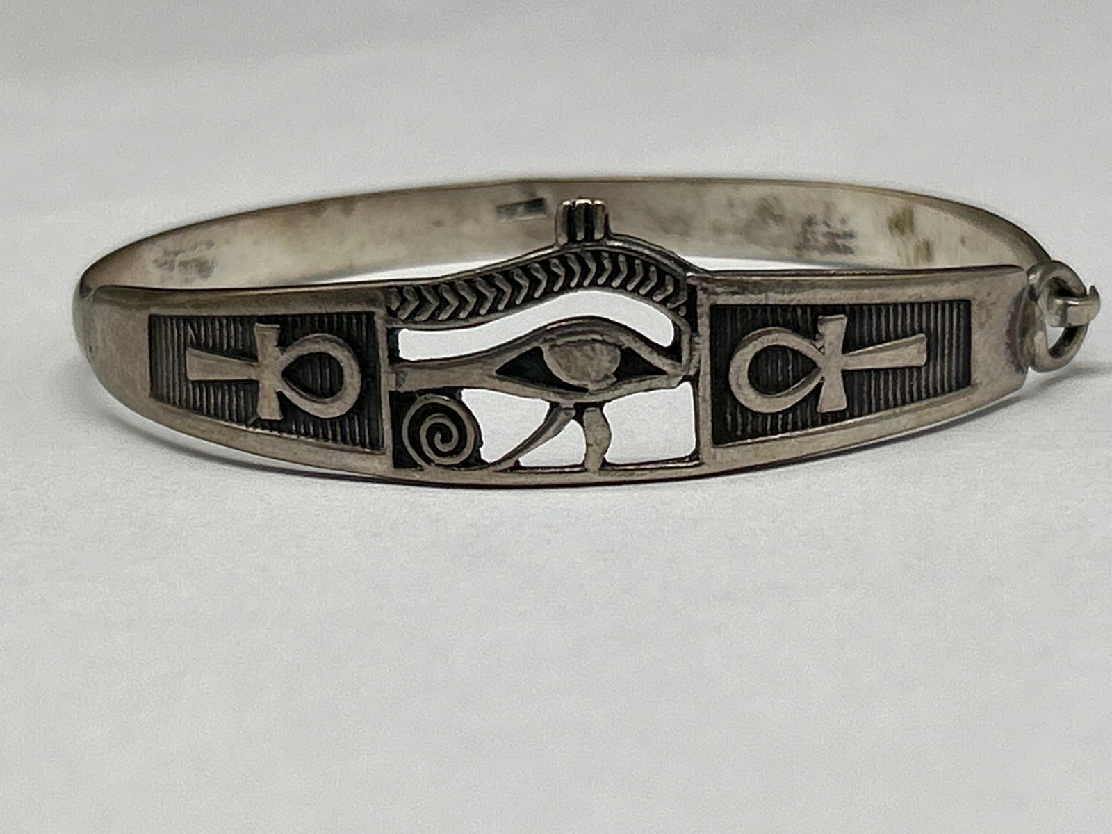 Egyptian Silver 925 Oxidized Eye Of Horus & Double Sided Ankh,Wedjat Bracelet, Hinged, Hallmarks: **Bidding on this lot is acceptance of Terms & Conditions found in the Auction Details section at the top of our Auction. Bidder agrees all questions should be submitted prior to placing a bid.**
