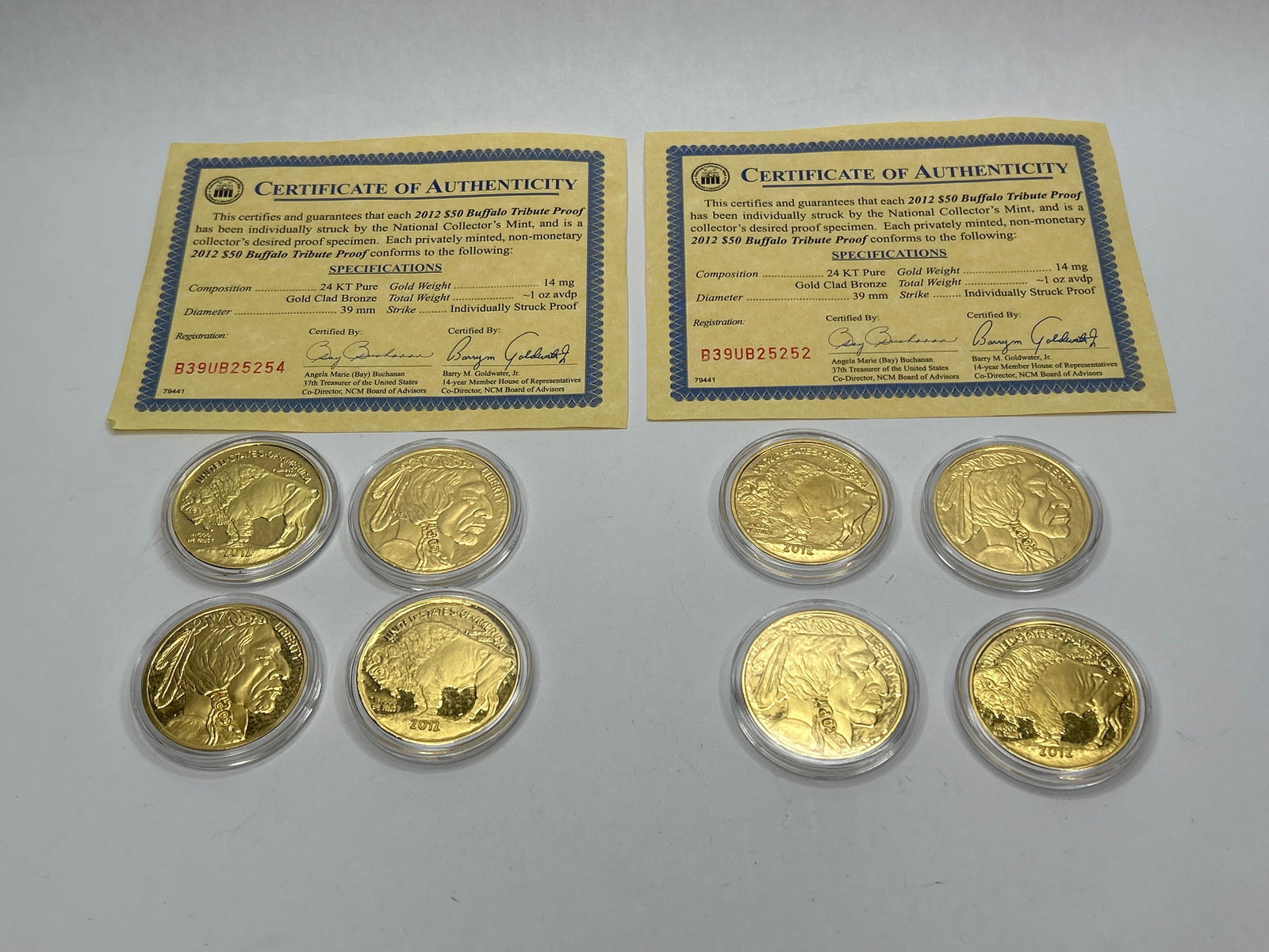 (8) 2012 $50 Buffalo Tribute Proof Coins, 24KT Pure Gold Clad Bronze, 39mm, 14mg Gold Content, COA: **Bidding on this lot is acceptance of Terms & Conditions found in the Auction Details section at the top of our Auction. Bidder agrees all questions should be submitted prior to placing a bid.**