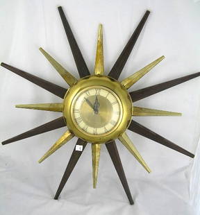 VINTAGE UNITED SUNBURST WALL CLOCK: MEASURES 24" AROUND