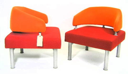 PAIR - ETTORE SOTTSASS - MEMPHIS CHAIRS: COVERED IN RED & ORAGE UPHOLSTERY ON GREY TUBULAR LEGS - MEASURES 29"H X 24"W X 23"D - F627