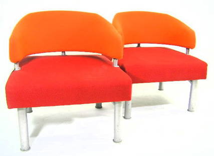PAIR - ETTORE SOTTSASS - MEMPHIS CHAIRS: COVERED IN RED & ORAGE UPHOLSTERY ON GREY TUBULAR LEGS - MEASURES 29"H X 24"W X 23"D - F628
