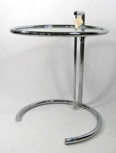 EILEEN GRAY TUBULAR CHROME TABLE: FEATURING ADJUSTABLE HEIGHT FRAME WITH ROUND GLASS TOP - MEASURES 25" TALL - F403