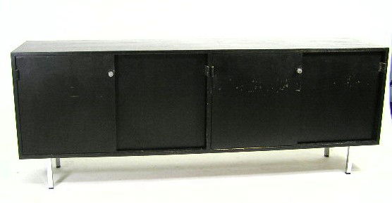 EARLY KNOLL - EBONIZED CREDENZA LEATHER PULLS: CIRCA 1950 WOOD CREDENZA WITH ORIGINAL LEATHER PULLS - 4 SLIDING DOORS ON CHROME BASE - MEASURES 27" X 71"X 18" - F553