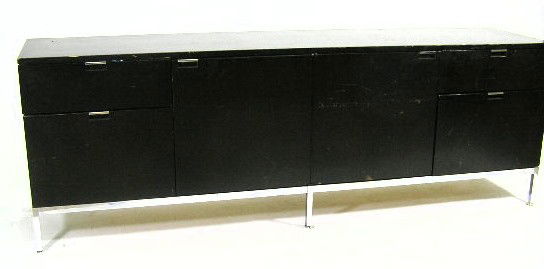 FLORENCE KNOLL CREDENZA - EBONIZED 4 PORTION: CREDENZA FEATURING 4 SECTION DOORS, DOORS WITH CHROME LEGS & PULLS - MEASURES 26"T X 74" X 18"